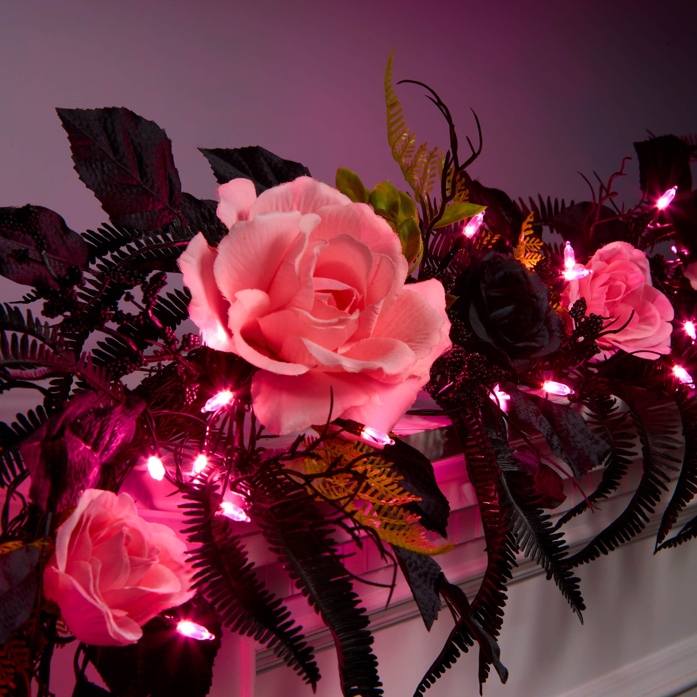 6ft. Cute &#x26; Creepy Pink &#x26; Black Halloween Flower Pre-Lit LED Garland