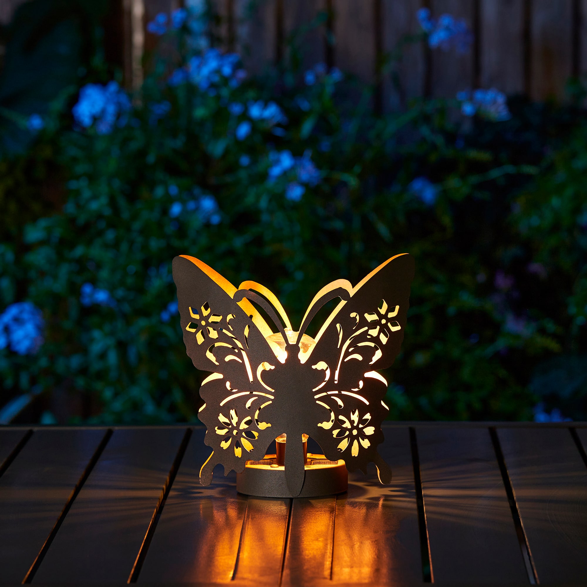 Glitzhome&#xAE; 9&#x22; Metal Flying Butterfly Silhouette Solar Powdered Edison Bulb Outdoor Lantern