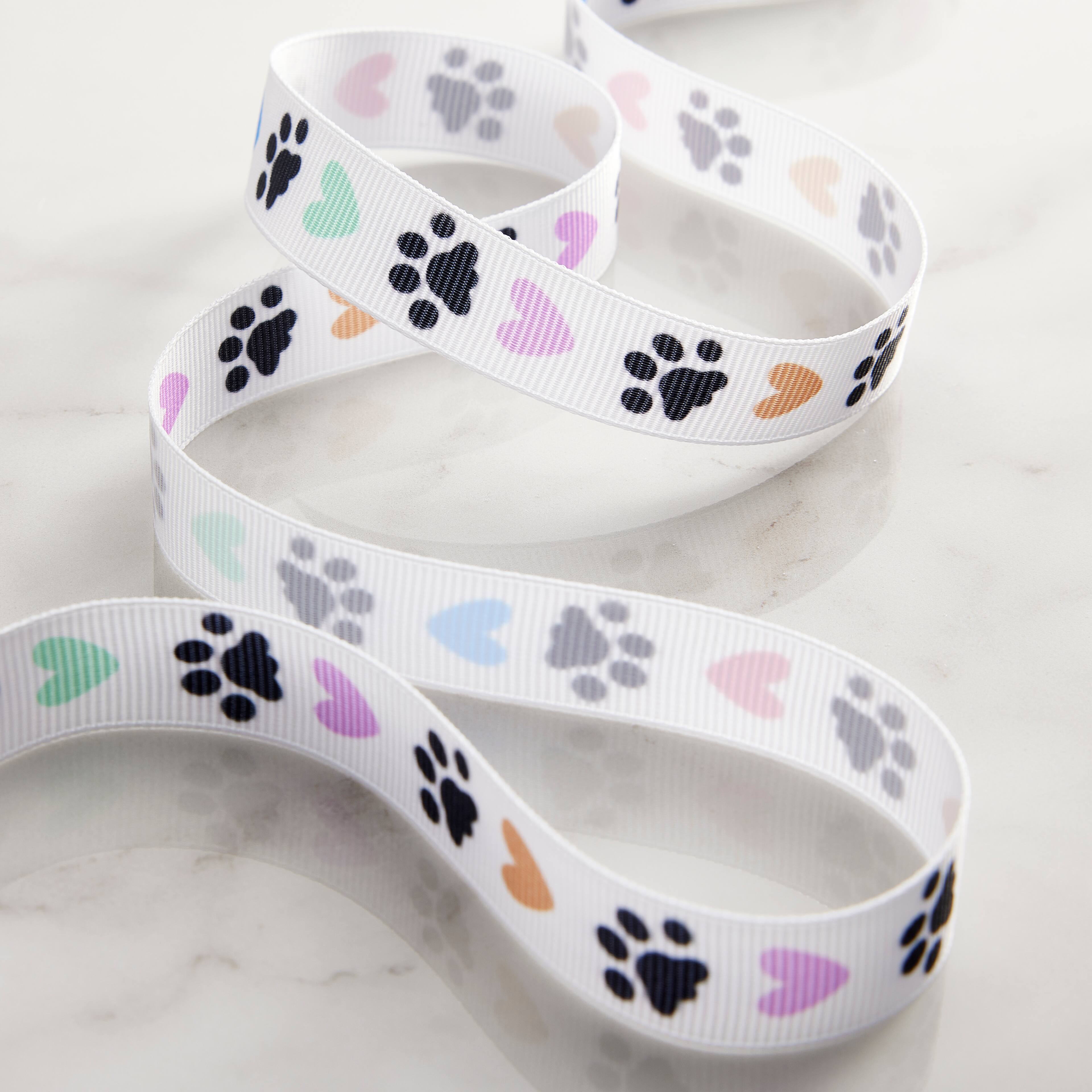 12 Pack: 5/8&#x22; x 7yd. Grosgrain Paw Print Ribbon by Celebrate It&#x2122;