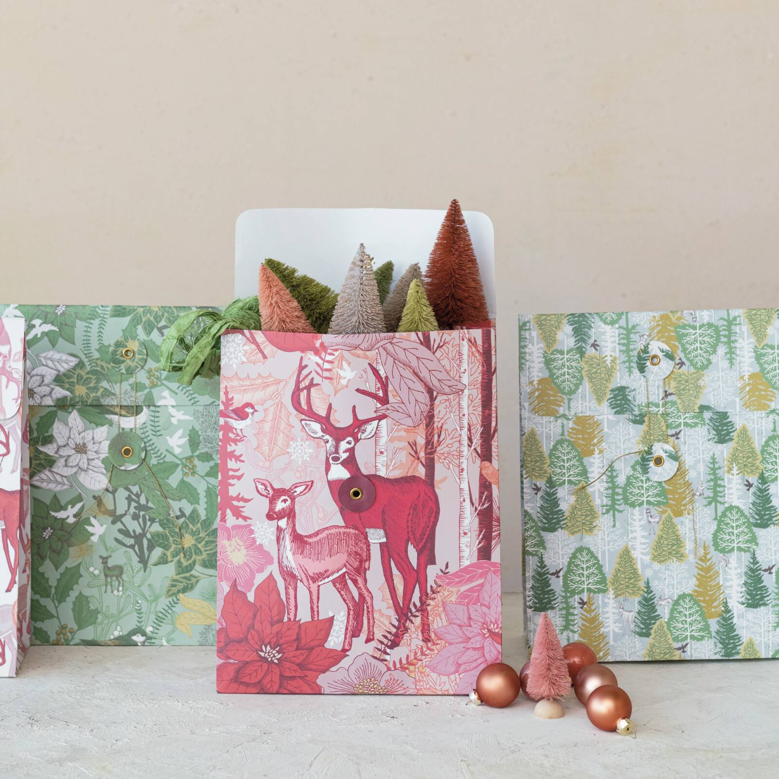 Hello Honey Multicolor Reindeer, Tree &#x26; Flowers Printed Paper Gift Bags with Tie Closures, 4ct.
