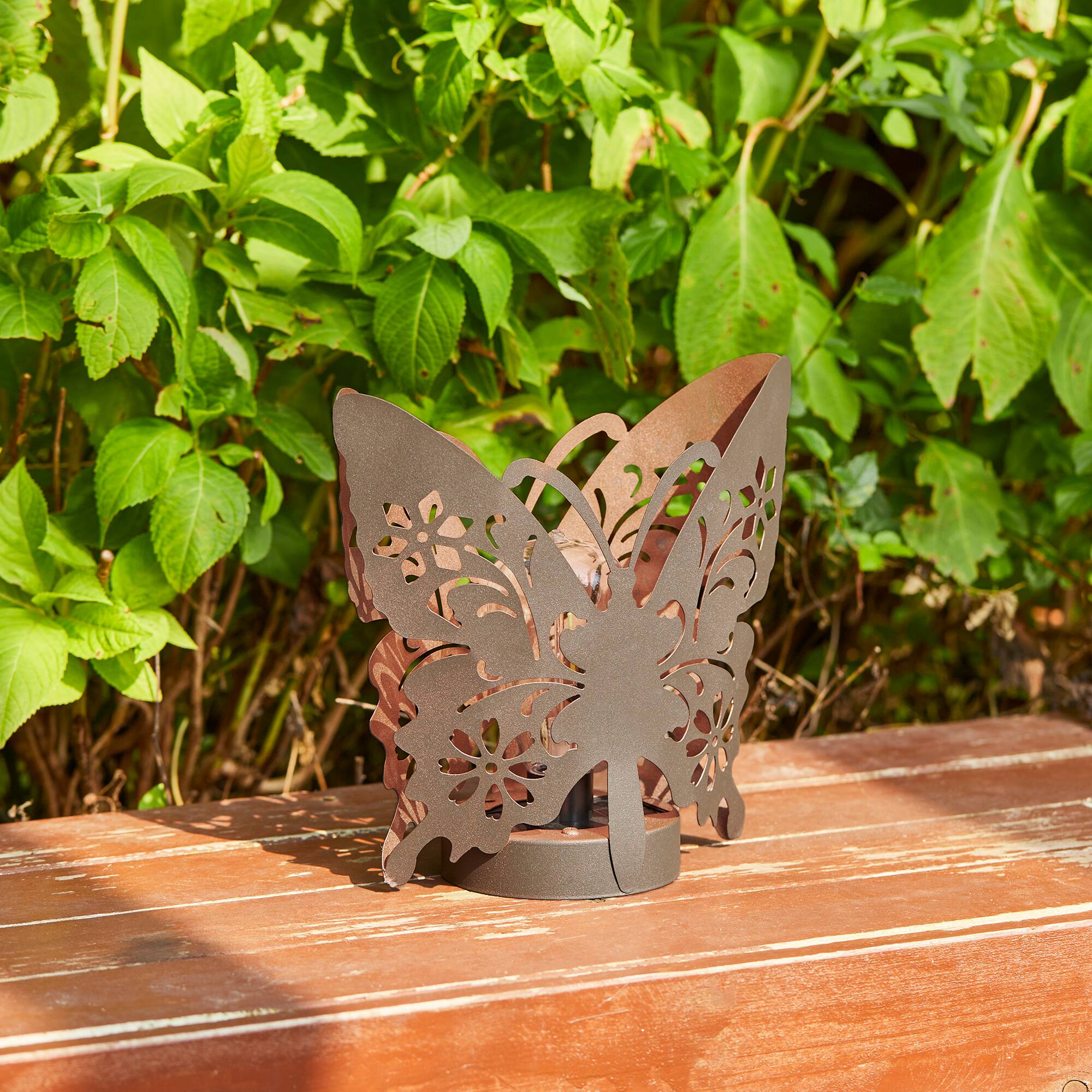 Glitzhome&#xAE; 9&#x22; Metal Flying Butterfly Silhouette Solar Powdered Edison Bulb Outdoor Lantern