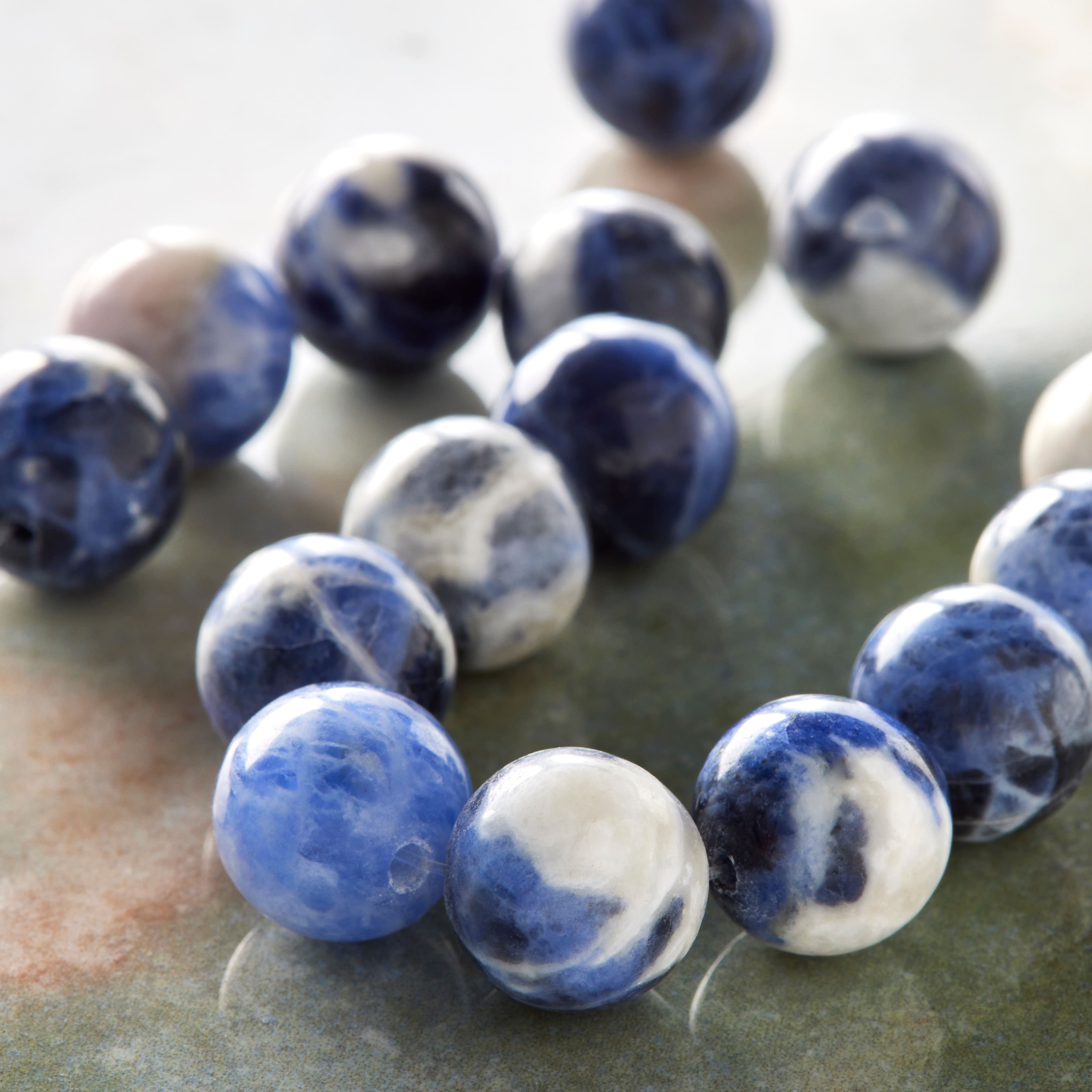 12 Pack: Blue Sodalite Stone Round Beads, 10mm by Bead Landing™