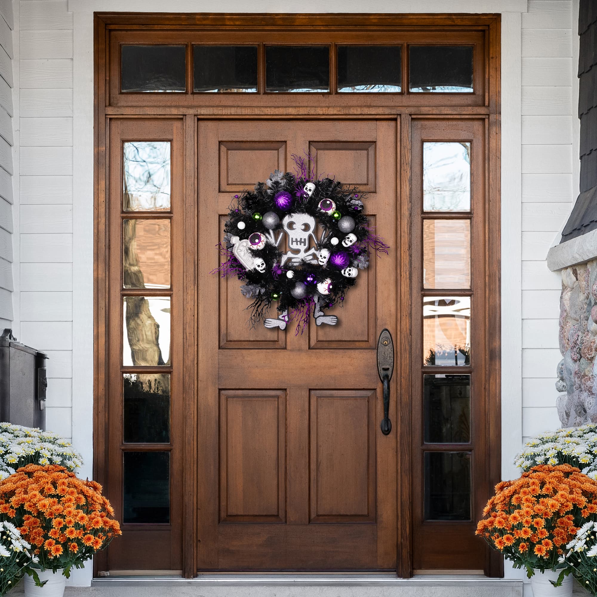 24'' Unlit Purple and Black Spooky Skeleton Pine Halloween Wreath