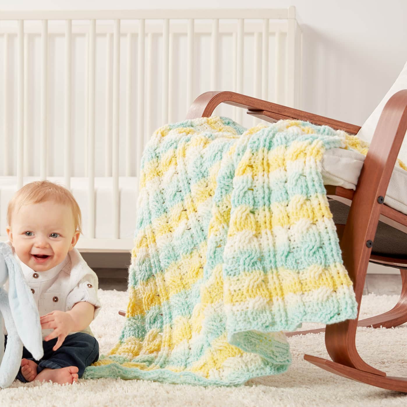 Caron® Baby Cakes™ Citrus Cables Crochet Baby Blanket | Michaels