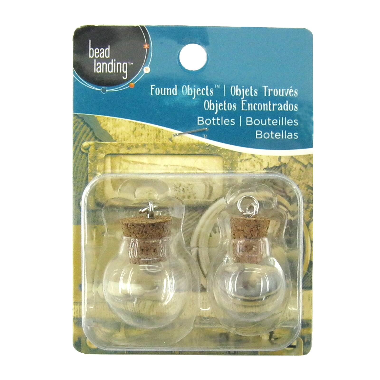 12 Packs: 2 ct. (24 total) Found Objects™ Clear Round Bottle Pendants by Bead Landing™