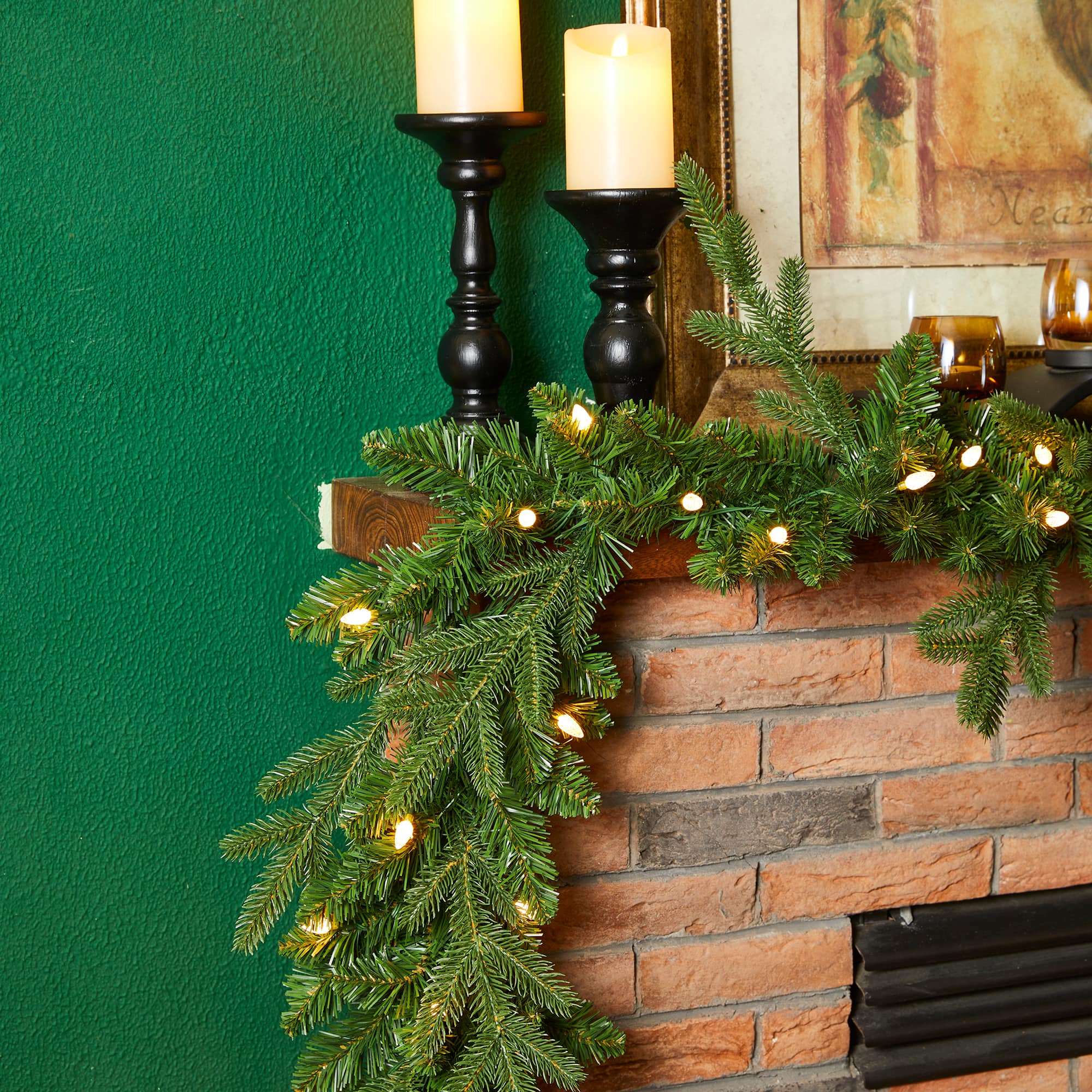 Glitzhome® 9ft. Pre-Lit Greenery Christmas Garland with Timer