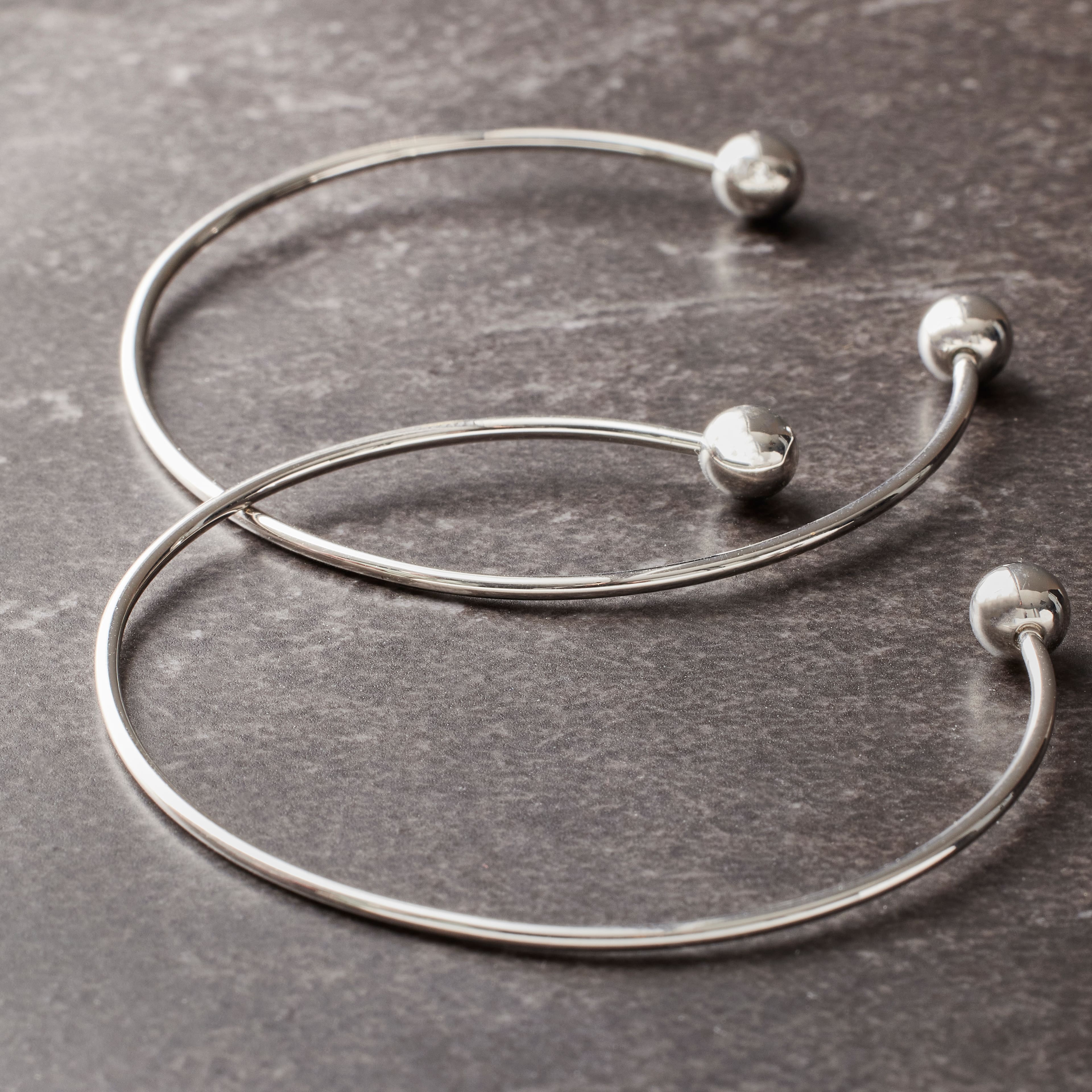 12 Packs: 2 ct. (24 total) Rhodium Bangles by Bead Landing™