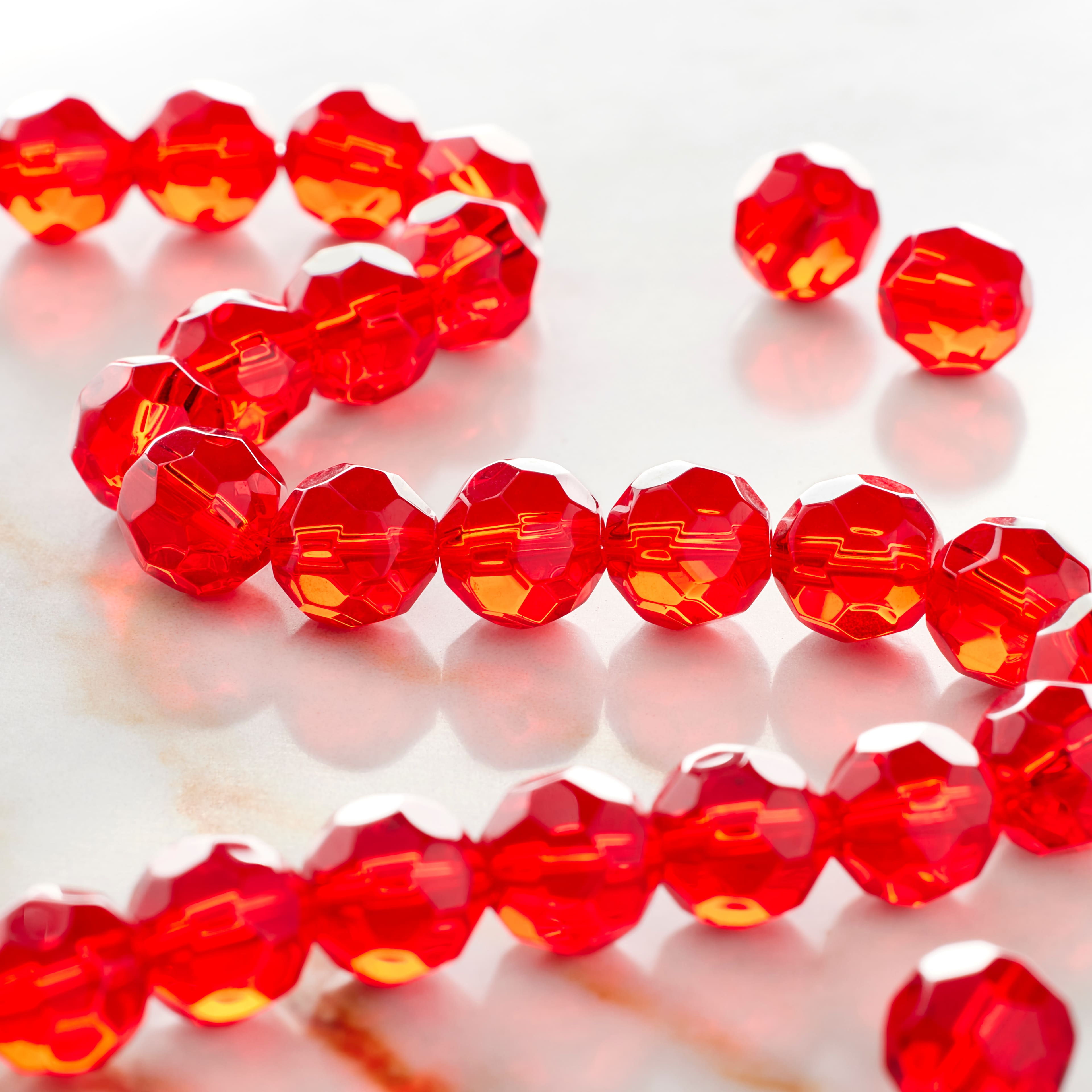 12 Pack: Ruby Faceted Glass Round Beads