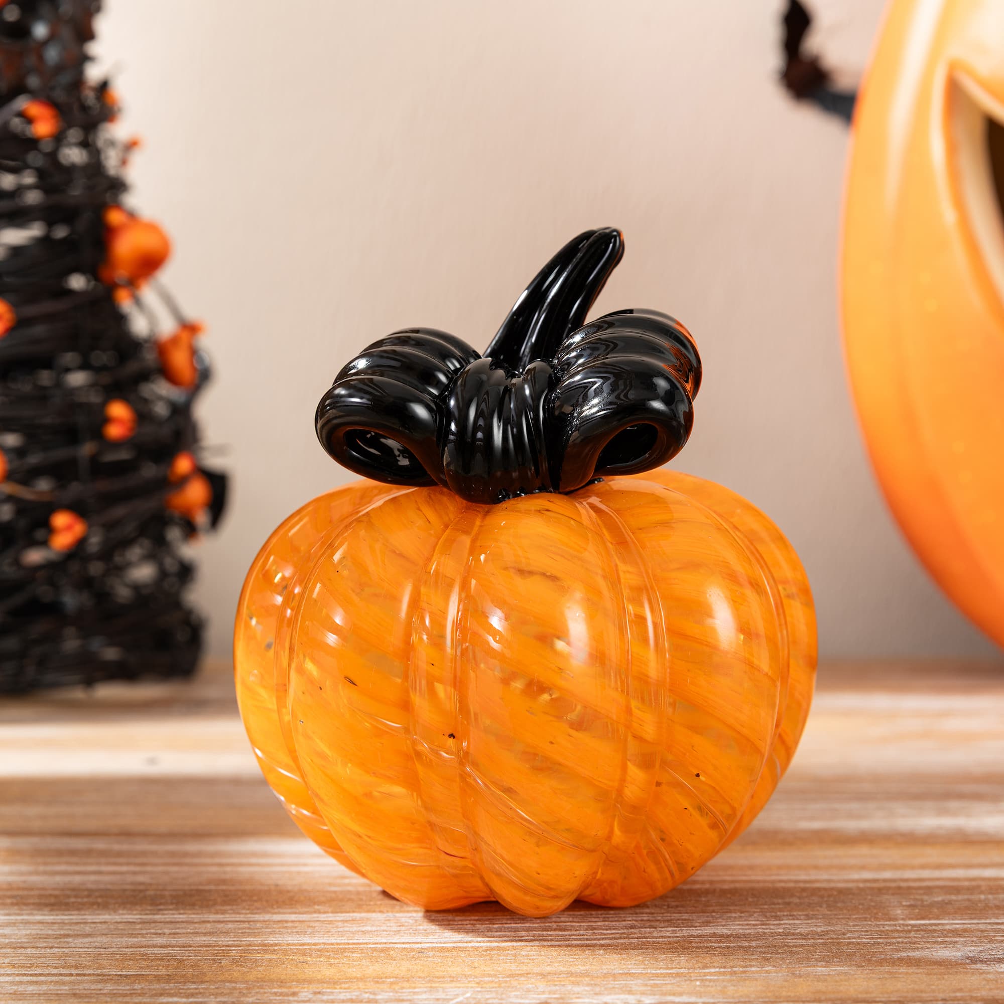 Glitzhome® 4.75" Halloween Striped Glass Pumpkin with Bow