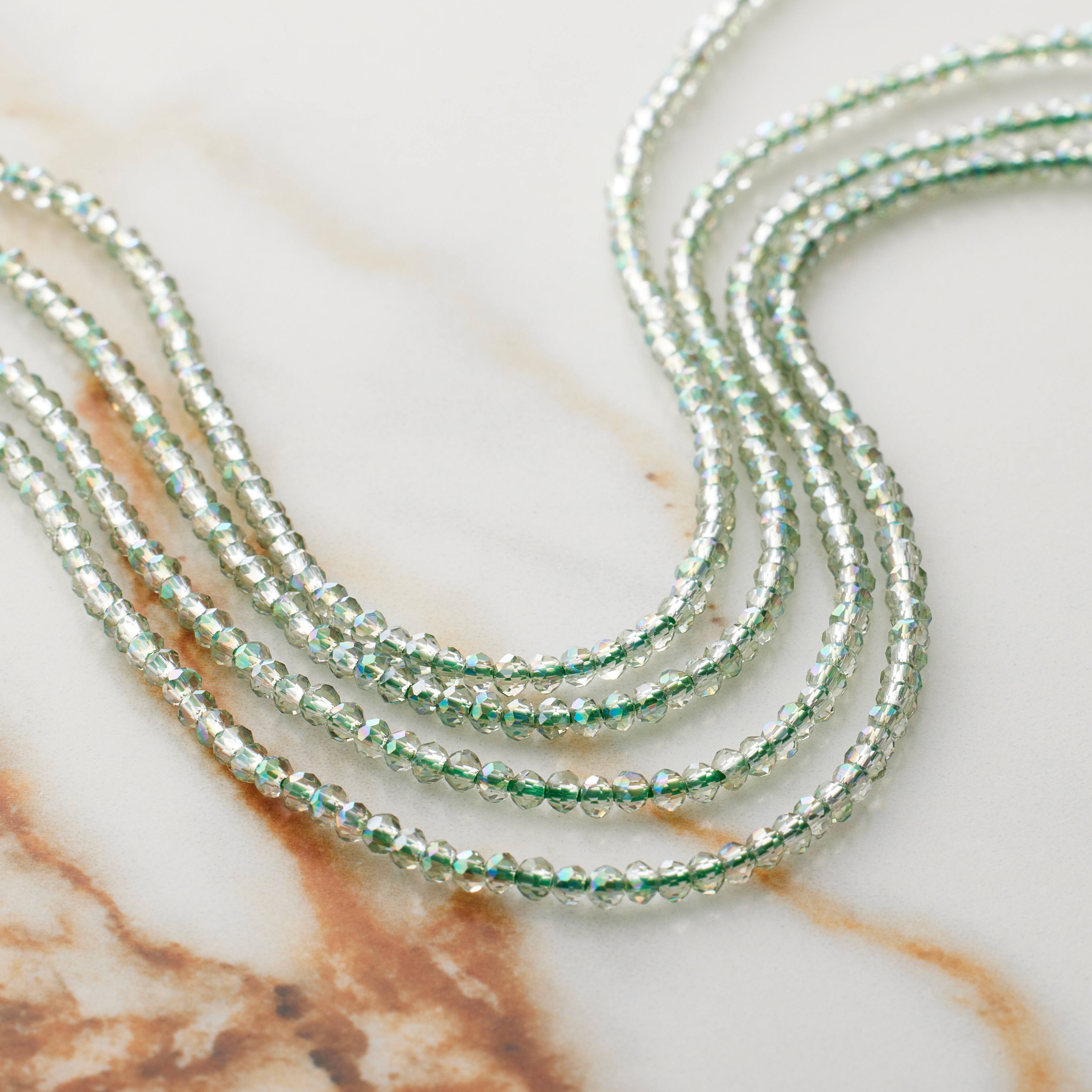 12 Pack: Light Green Faceted Glass Rondelle Beads, 2mm by Bead Landing™