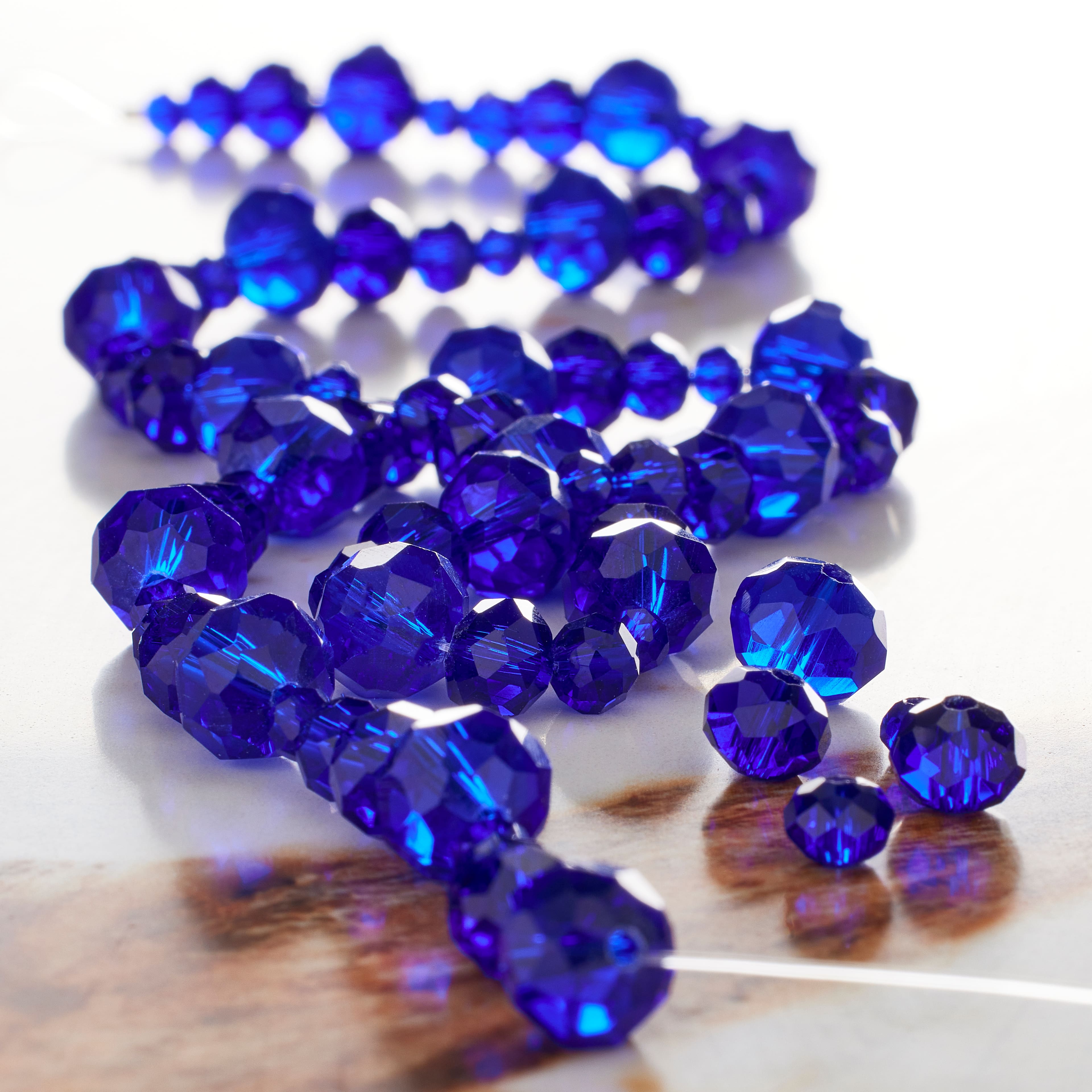 Blue Faceted Glass Rondelle Beads by Bead Landing™