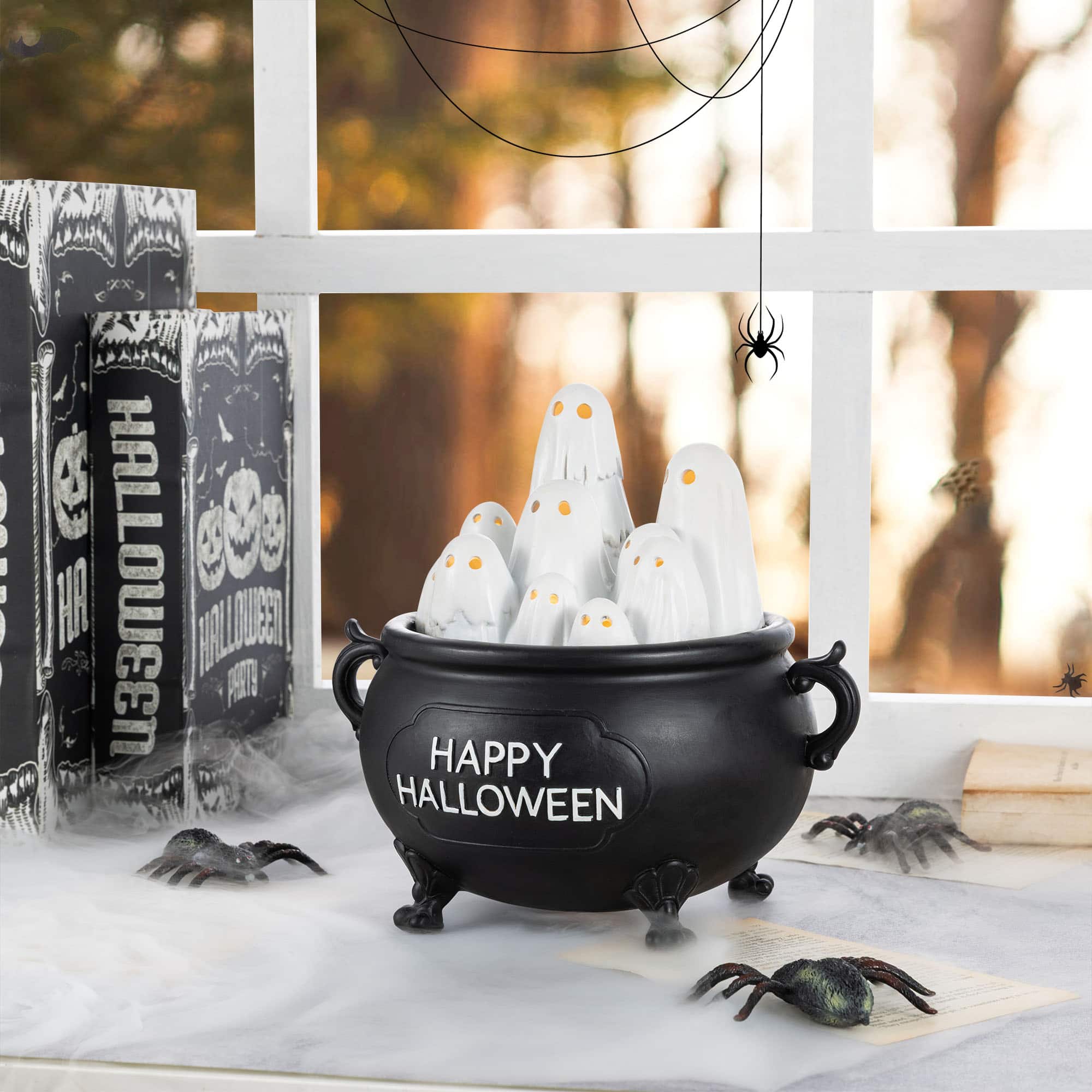 Glitzhome® 9" Halloween Lighted Polyresin Ghosts in Cauldron Table Decor with Timer