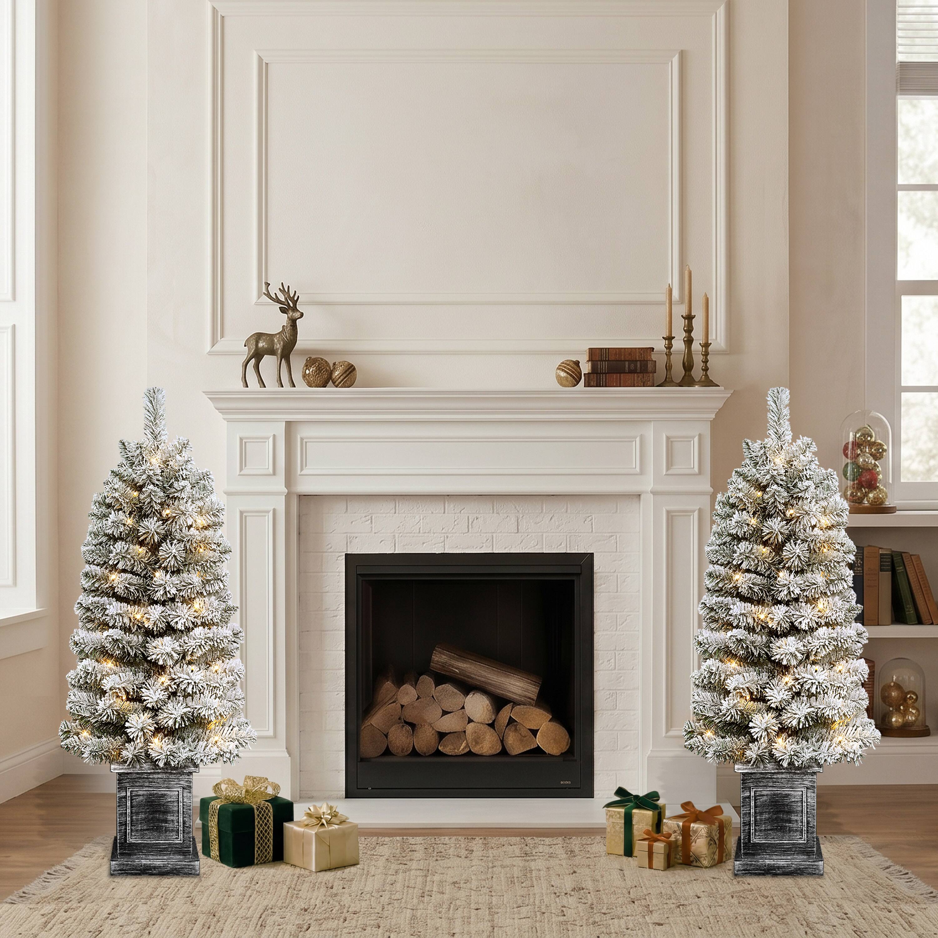 Puleo International 3.5ft. Pre-Lit Battery-Operated Flocked Spruce Artificial Christmas Trees with Pinecones, Warm White LED Lights, 2ct.