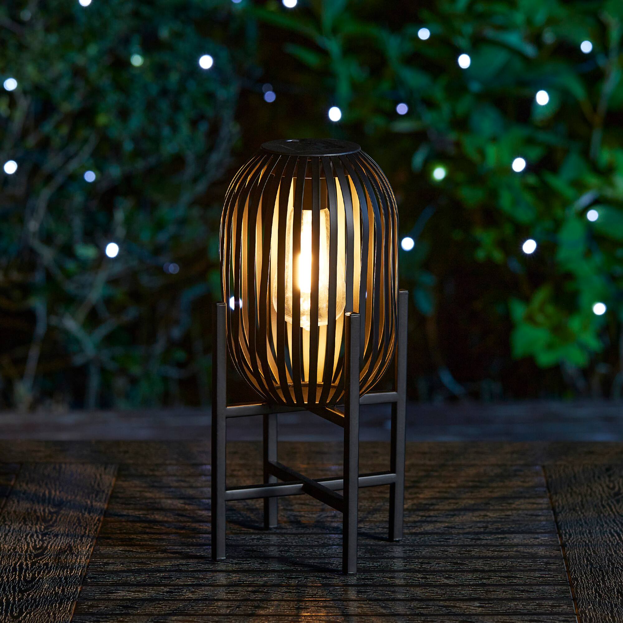 Glitzhome® 14.25" Black Slim Metal Stripes Solar Powered Edison Bulb Outdoor Lantern