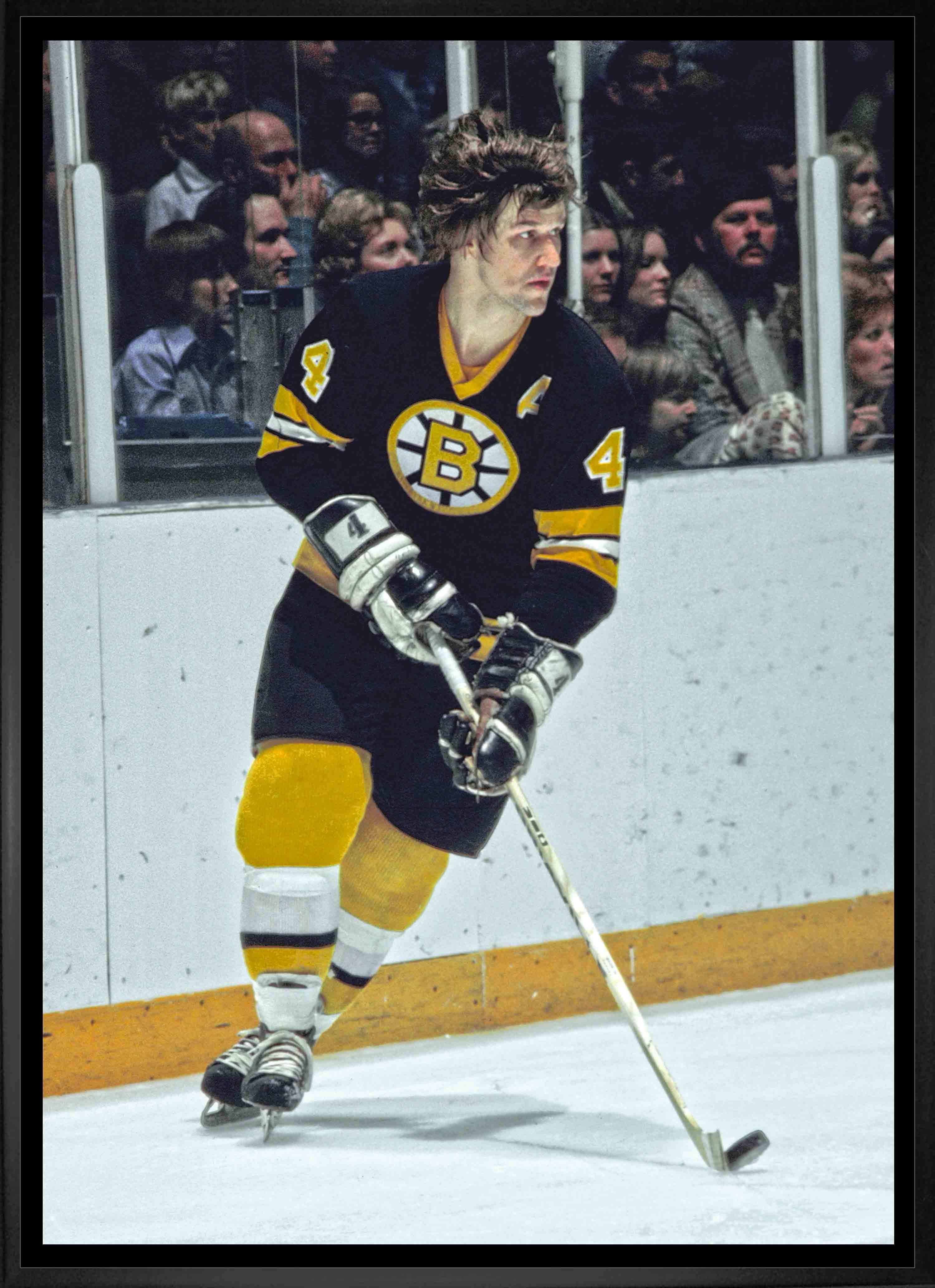 Bobby Orr Boston Bruins Framed 20" x 29" Skating With Puck Canvas 22.5" x 31.5"