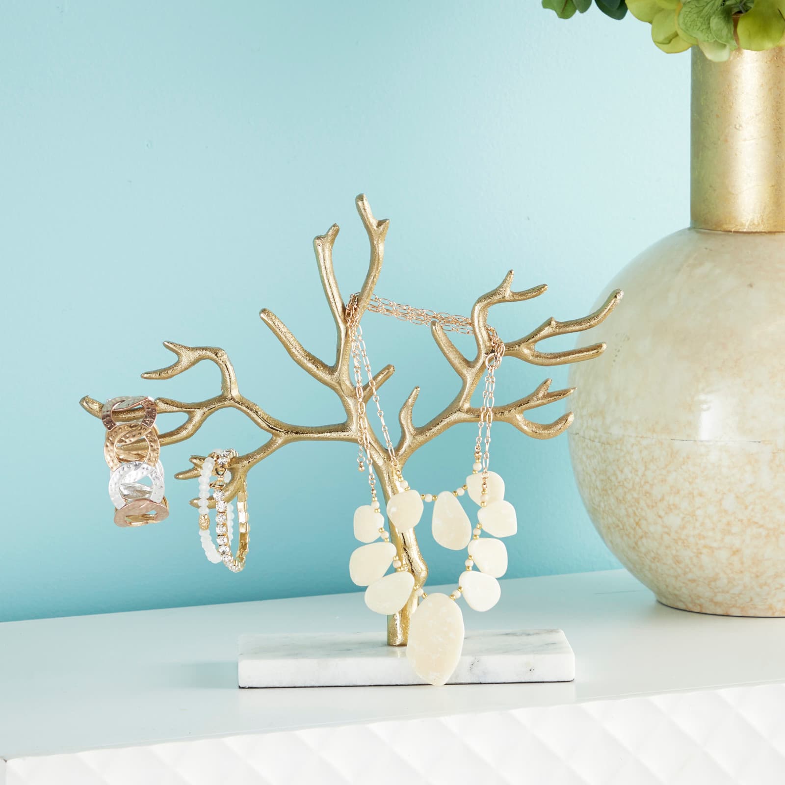 CosmoLiving by Cosmopolitan 10" Gold Marble Jewelry Stand