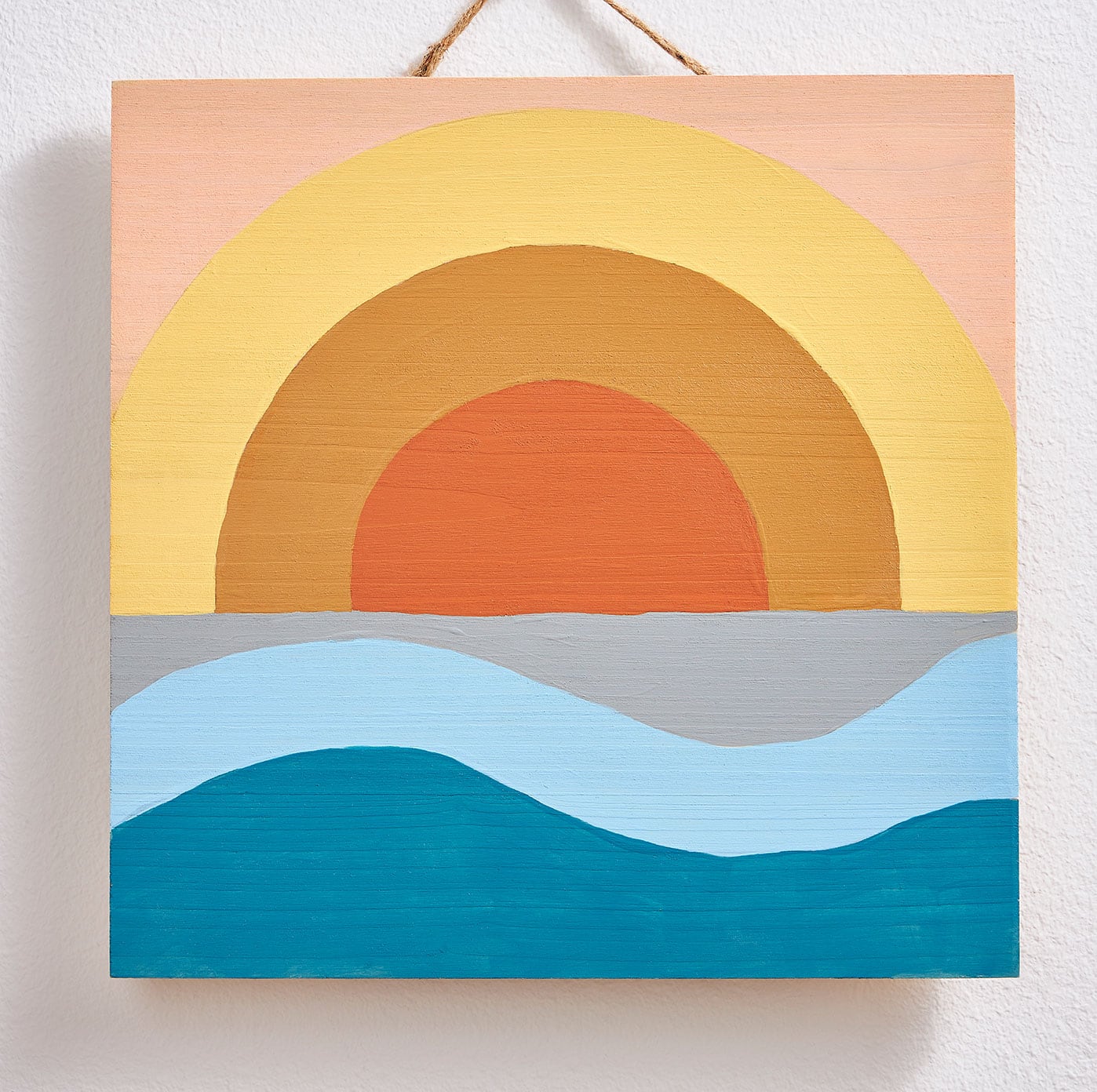 Peinture du lever du soleil sur plaque de bois