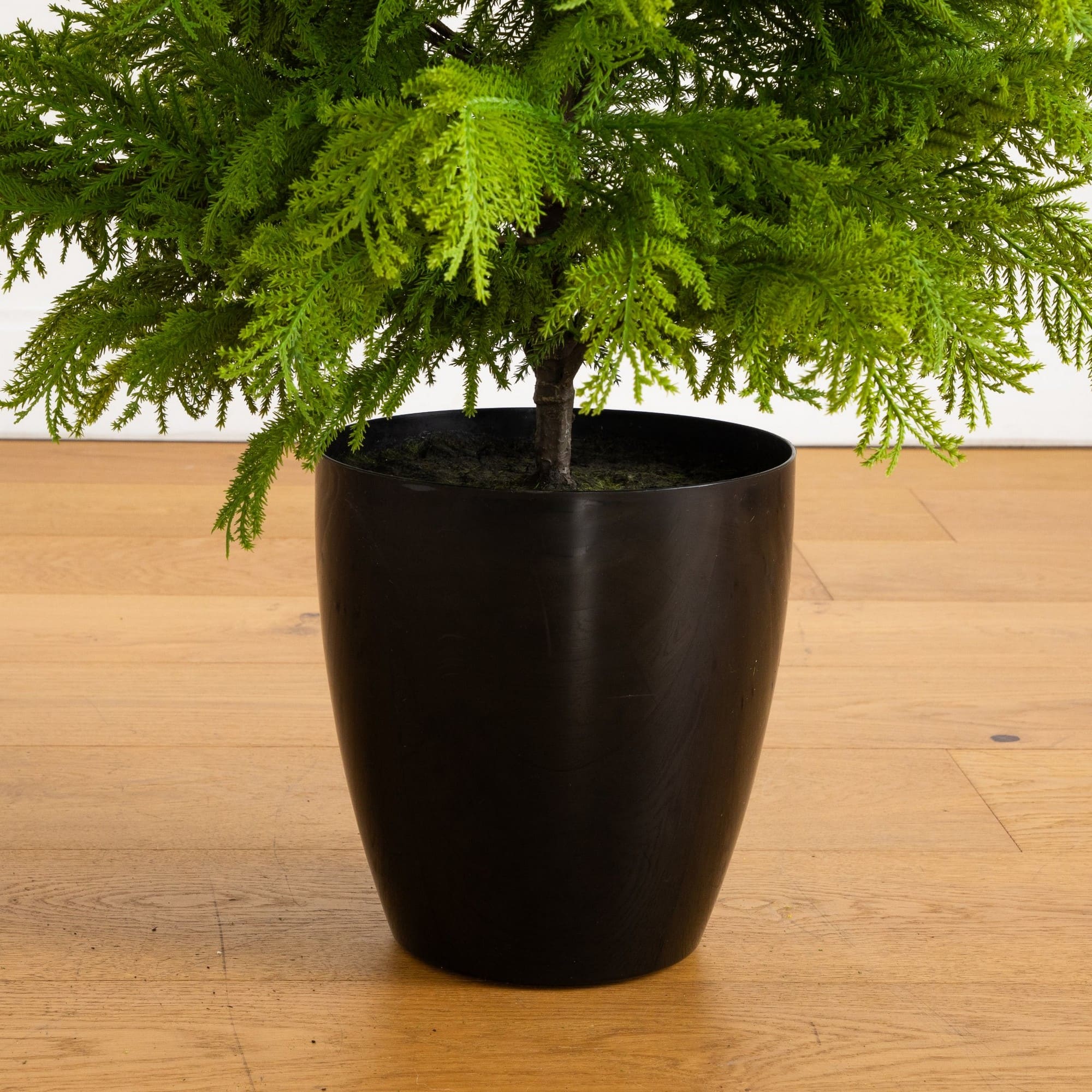 Nearly Natural 4ft. Unlit Artificial Real Touch Goldcrest Christmas Tree in Black Decorative Planter