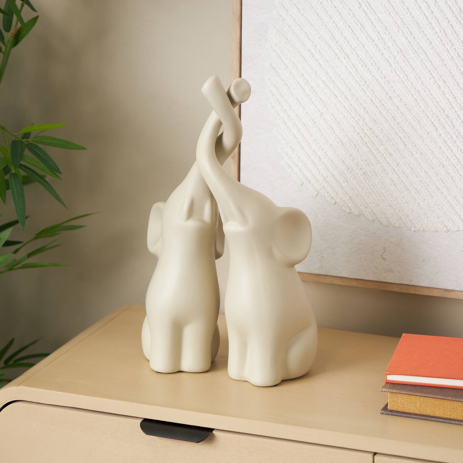 13" Cream Ceramic Elephant Decorative Sculpture with Raised Trunks, 2ct.