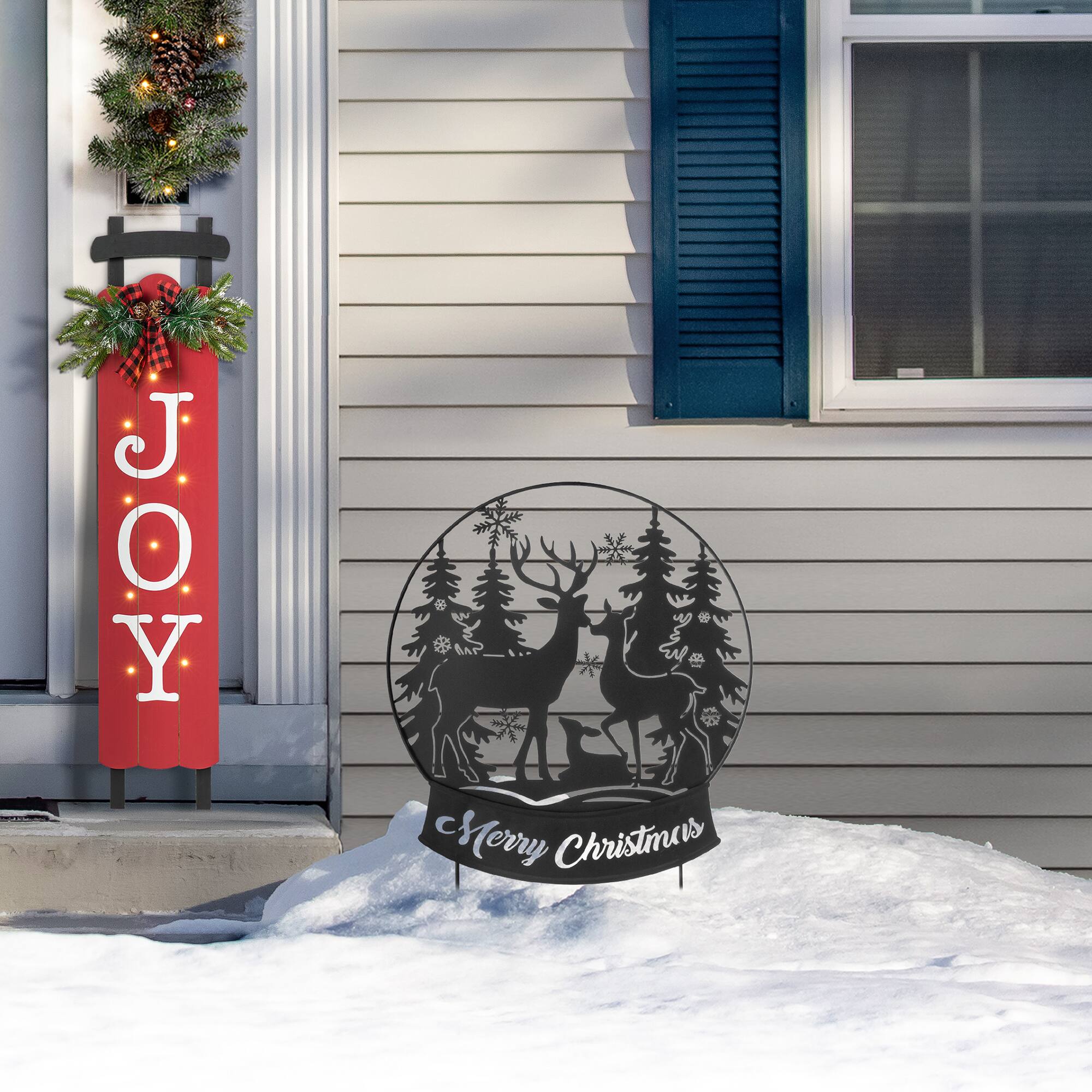 Glitzhome® 2.5ft. Metal Water Globe with Reindeer Family Silhouette Yard Stake