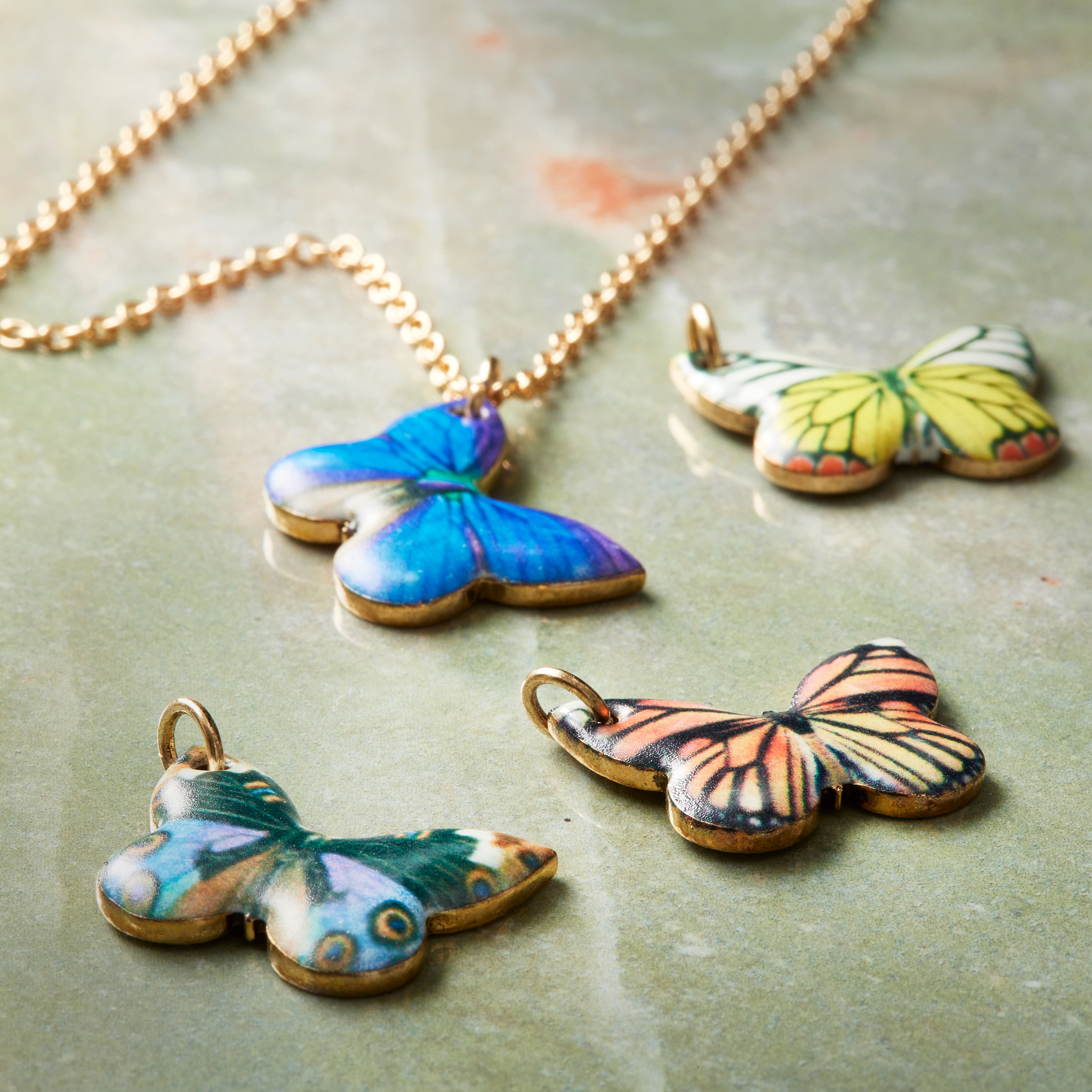 12 Packs: 4 ct. (48 total) Charmalong™ Photo-Real Butterfly Charms by Bead Landing™