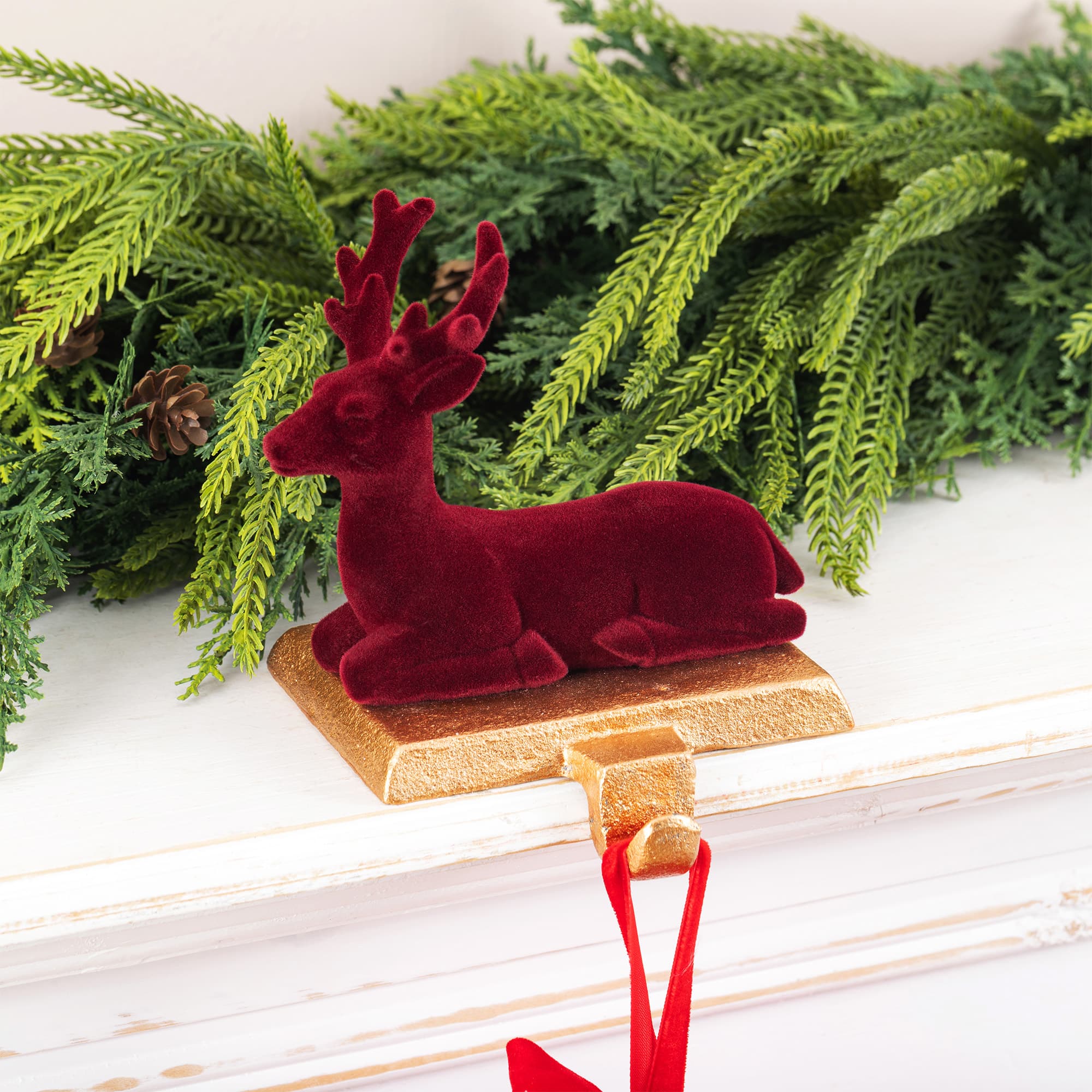 Glitzhome® Set of 2 Flocked Burgundy Resin Standing & Sitting Reindeer Stocking Holders