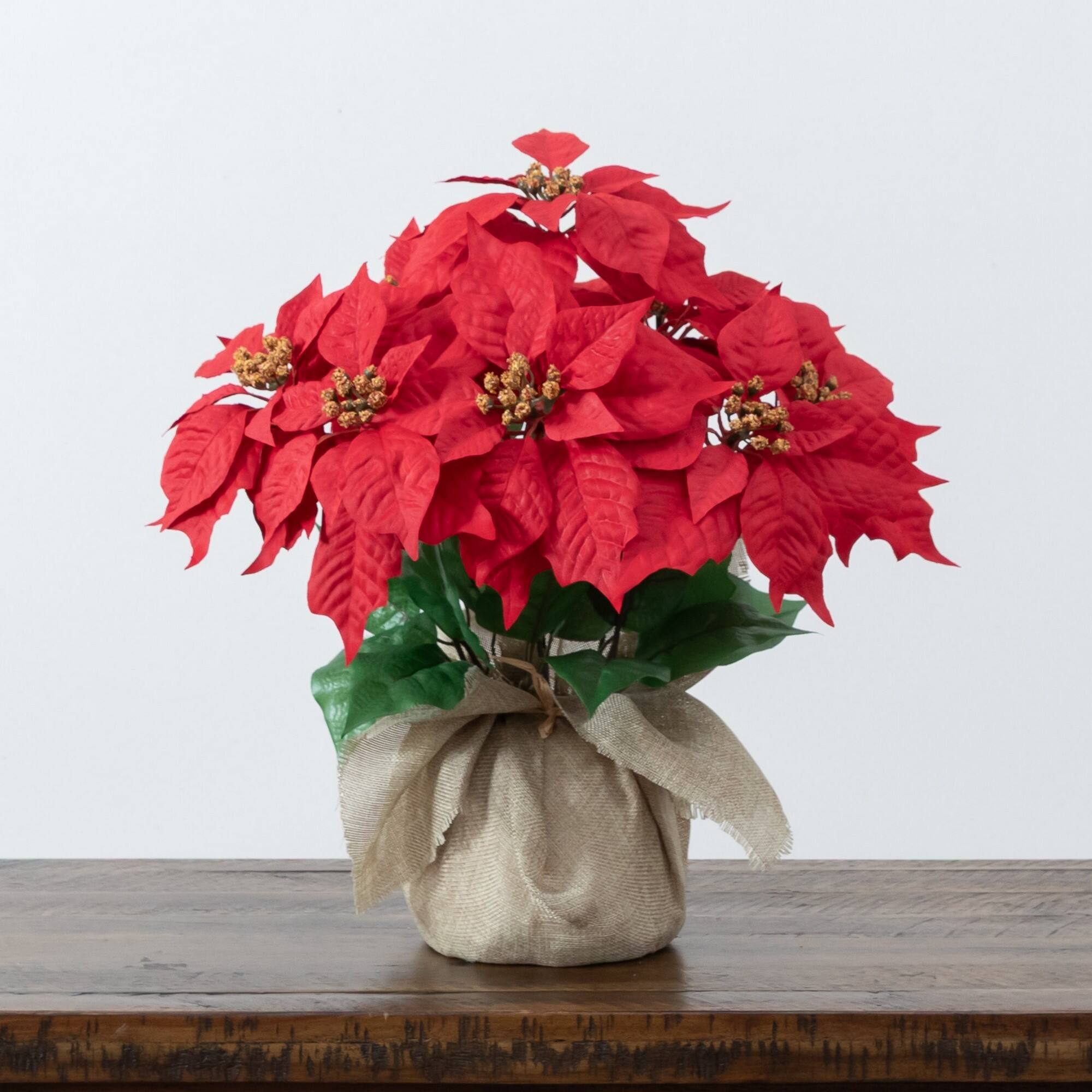Nearly Natural 16.5" Artificial Poinsettia Arrangement in Burlap Planter