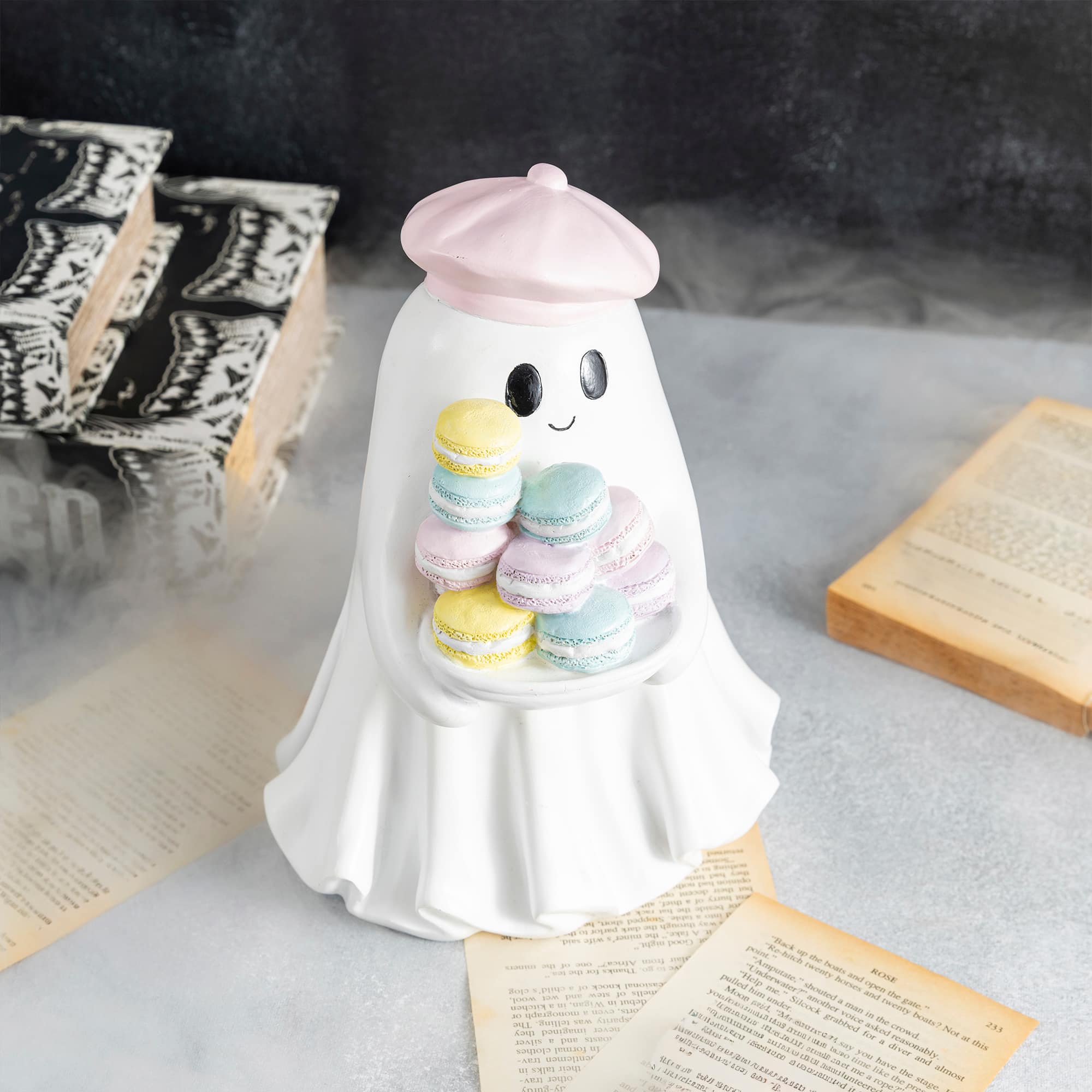 Glitzhome® 9.75" Halloween Polyresin Ghost with Macarons Table Decor