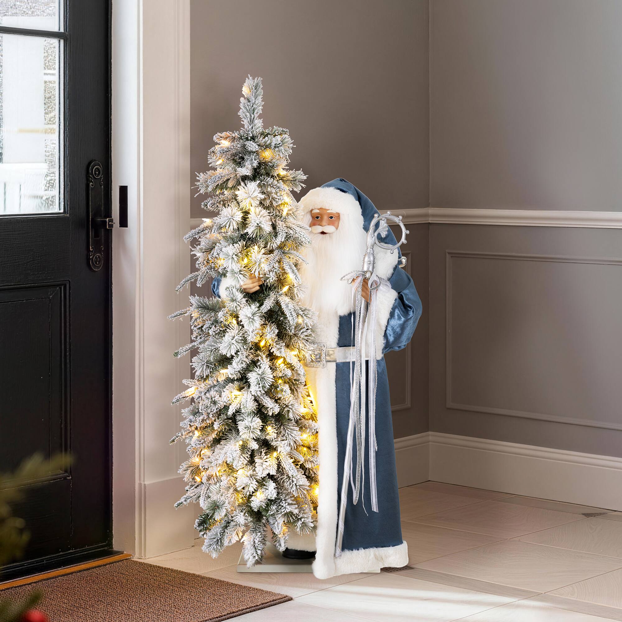 Glitzhome® 3.5ft. Oversized Deluxe Blue Christmas Santa with 4ft Lighted Flocked Artificial Christmas Tree
