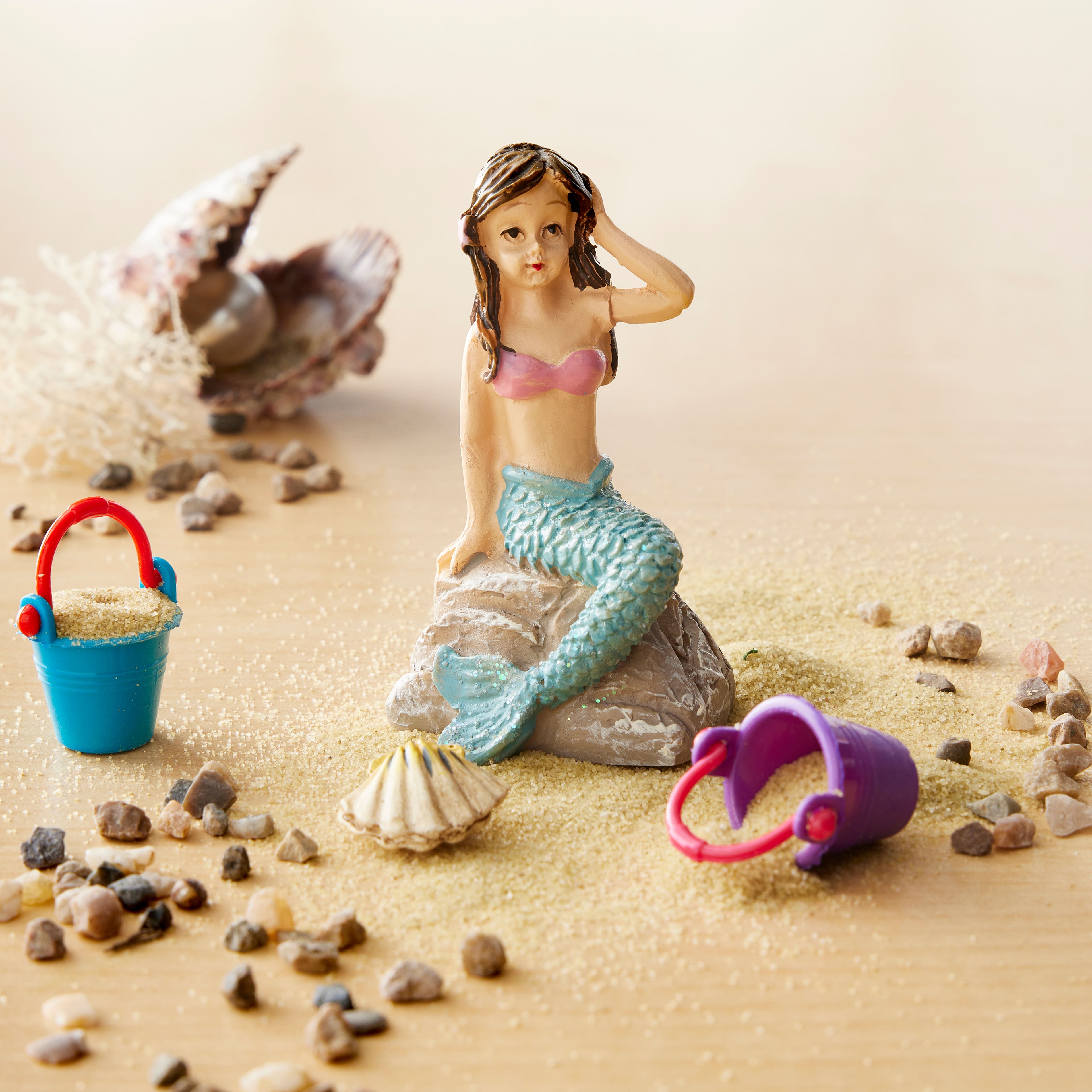 Miniature Mermaid on a Rock by Make Market®