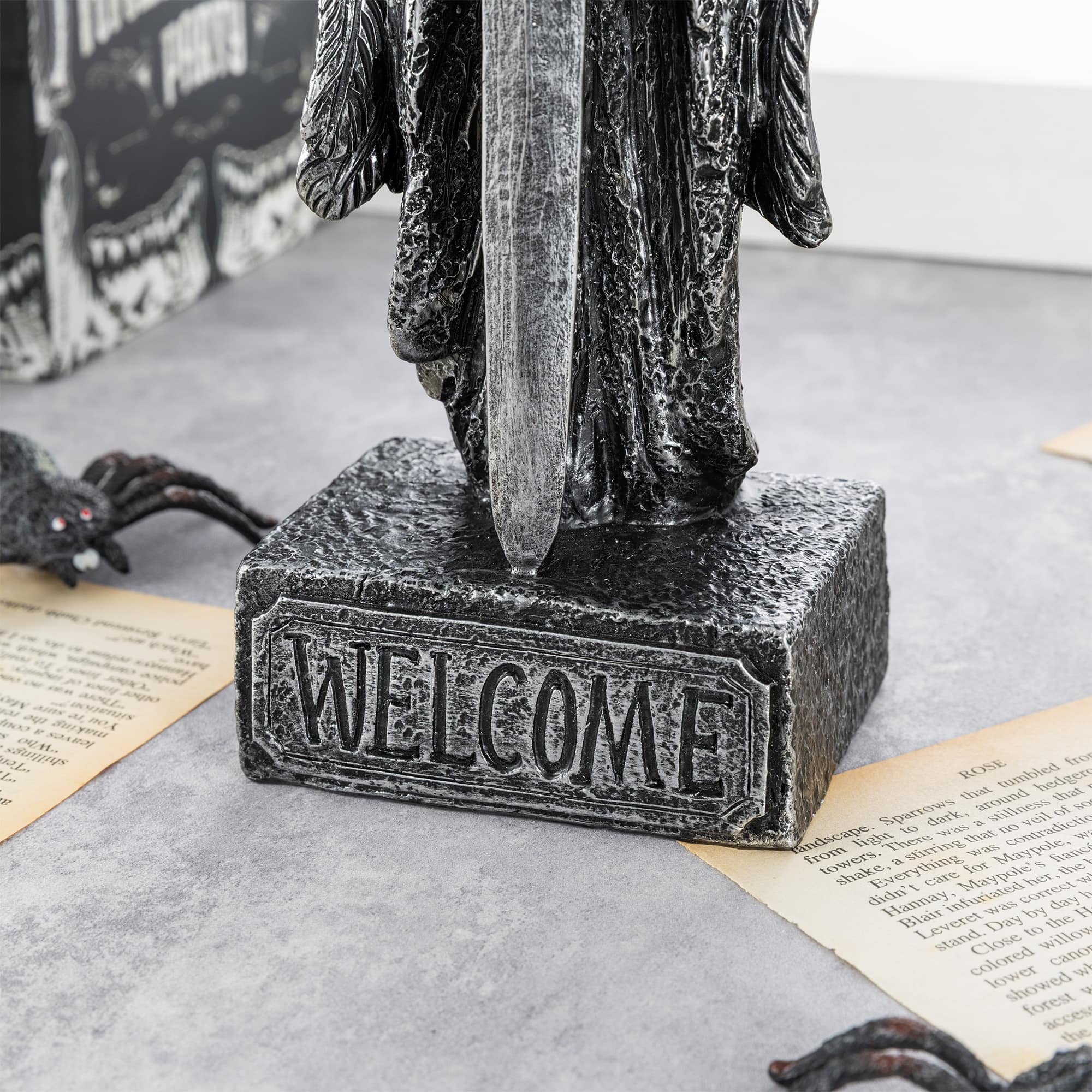 Glitzhome® 12" Halloween Lighted Resin Grim Reaper Table Decor with Timer