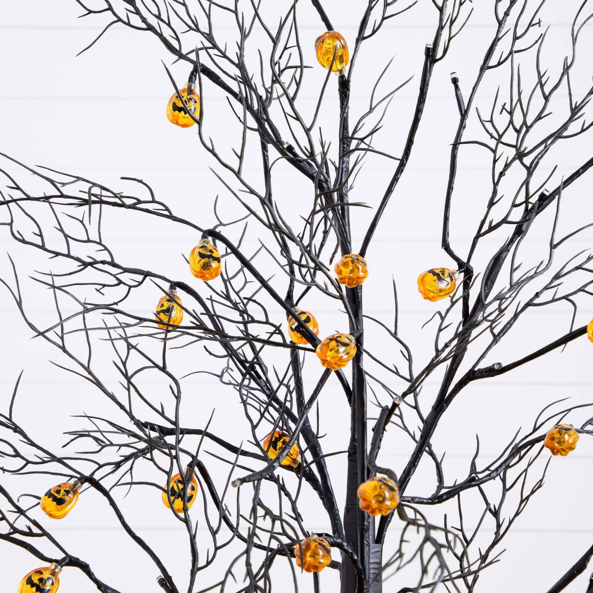 4ft. Pre-Lit Artificial Halloween Black Twig Tree with 24 Orange LED Pumpkin Shaped Lights