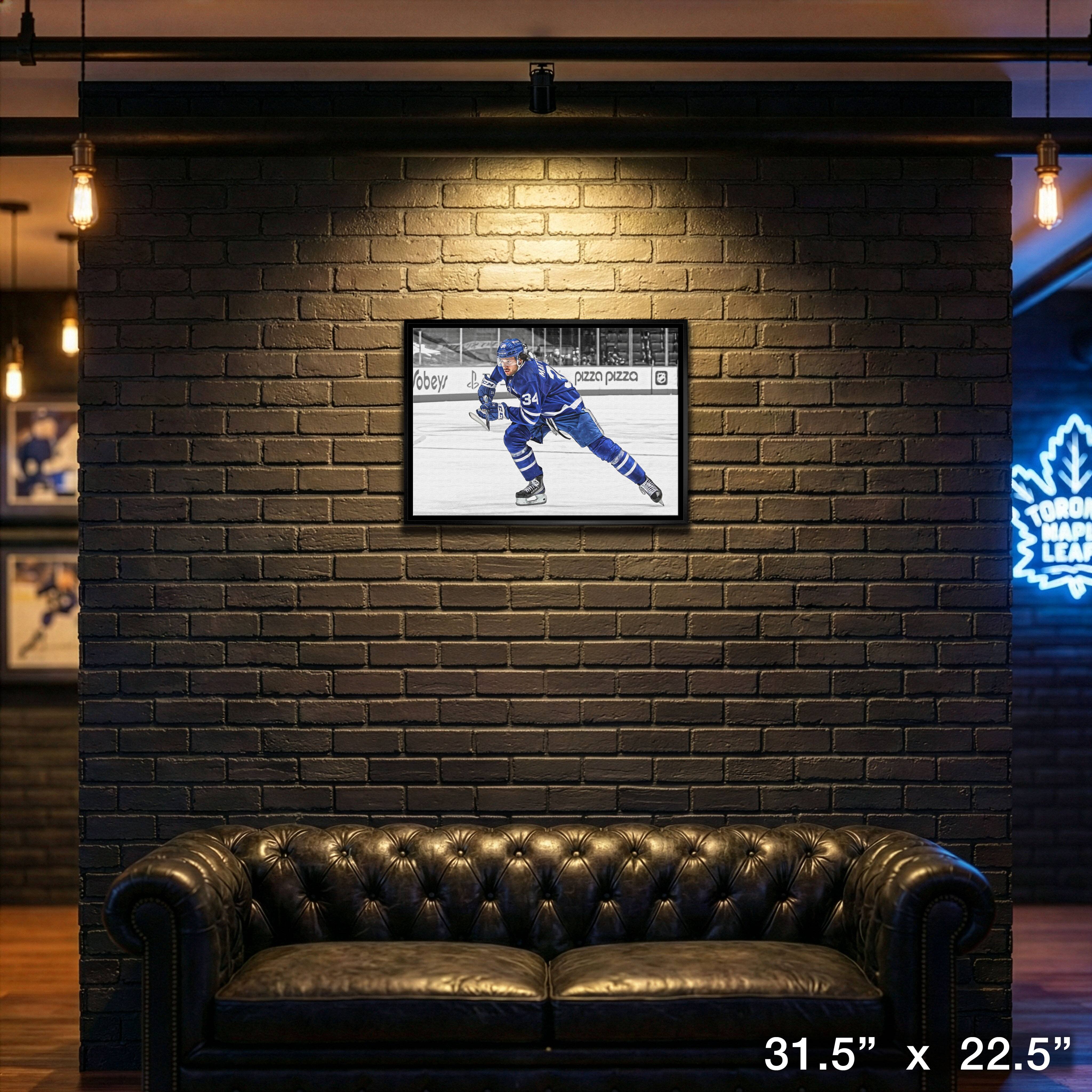 Auston Matthews Toronto Maple Leafs Framed 20" x 29" Hustling Spotlight Canvas 31.5" x 22.5"