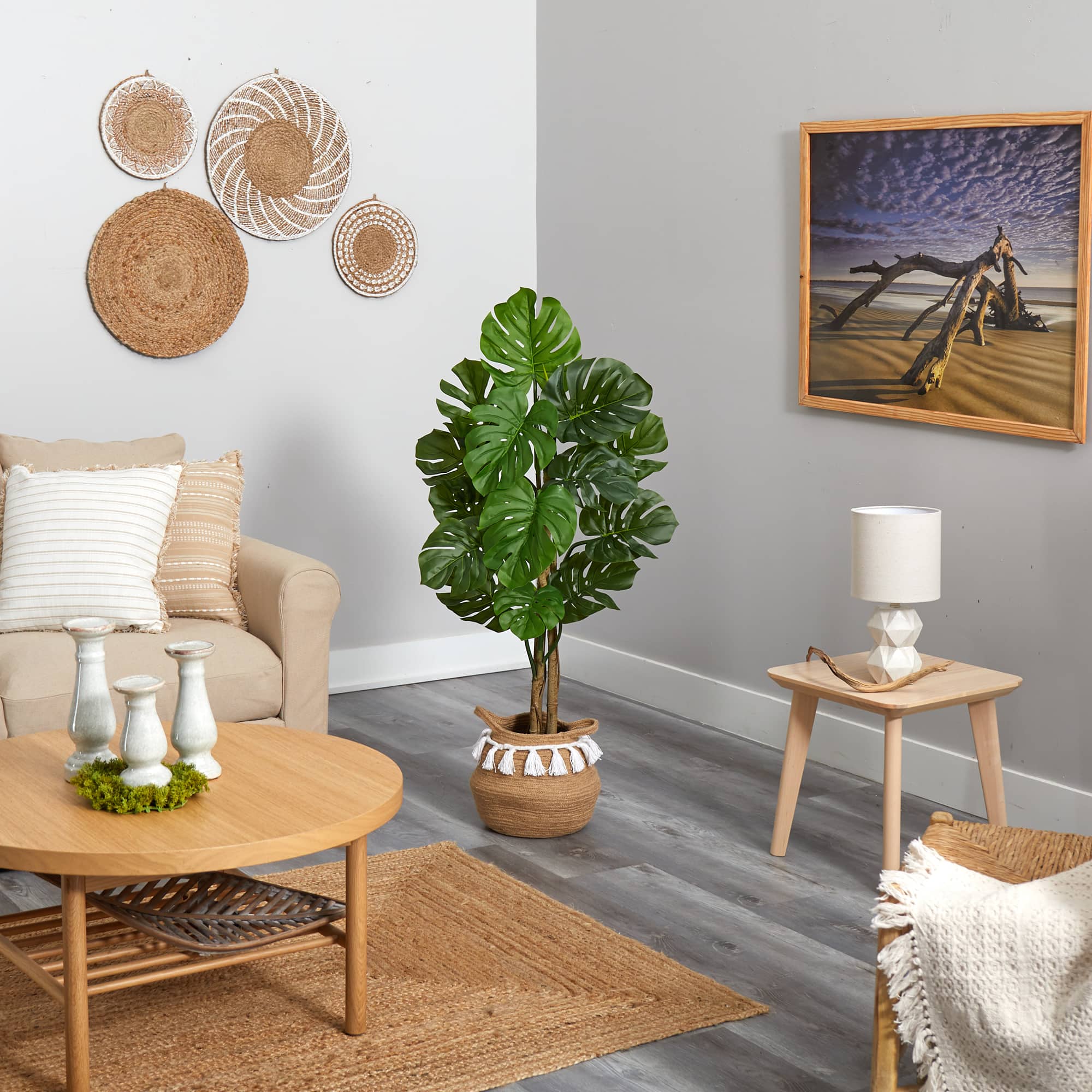 4ft. Monstera Artificial Tree in Boho Chic Handmade Natural Cotton Woven Planter with Tassels UV Resistant (Indoor/Outdoor)
