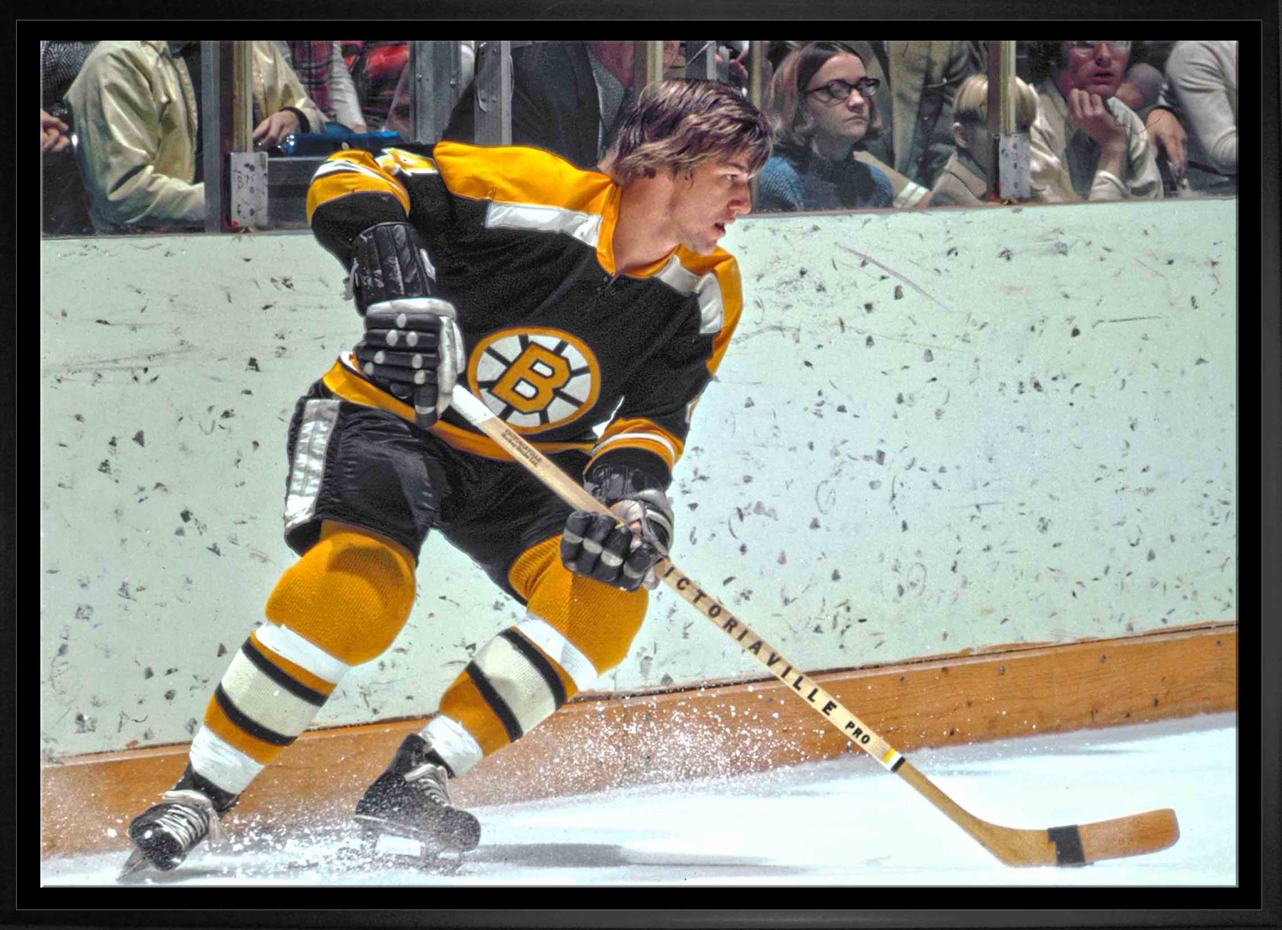 Bobby Orr Boston Bruins Framed 20" x 29" Skating Black Jersey Canvas 31.5" x 22.5"