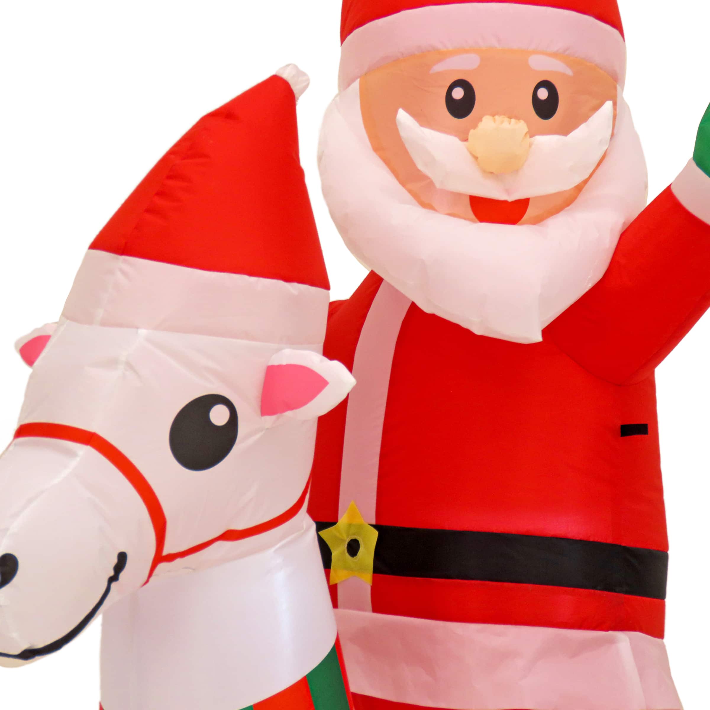 First Traditions™ 6ft. Red Inflatable Blow Up Santa on Rocking Horse with 3 Warm White UL LED Lights