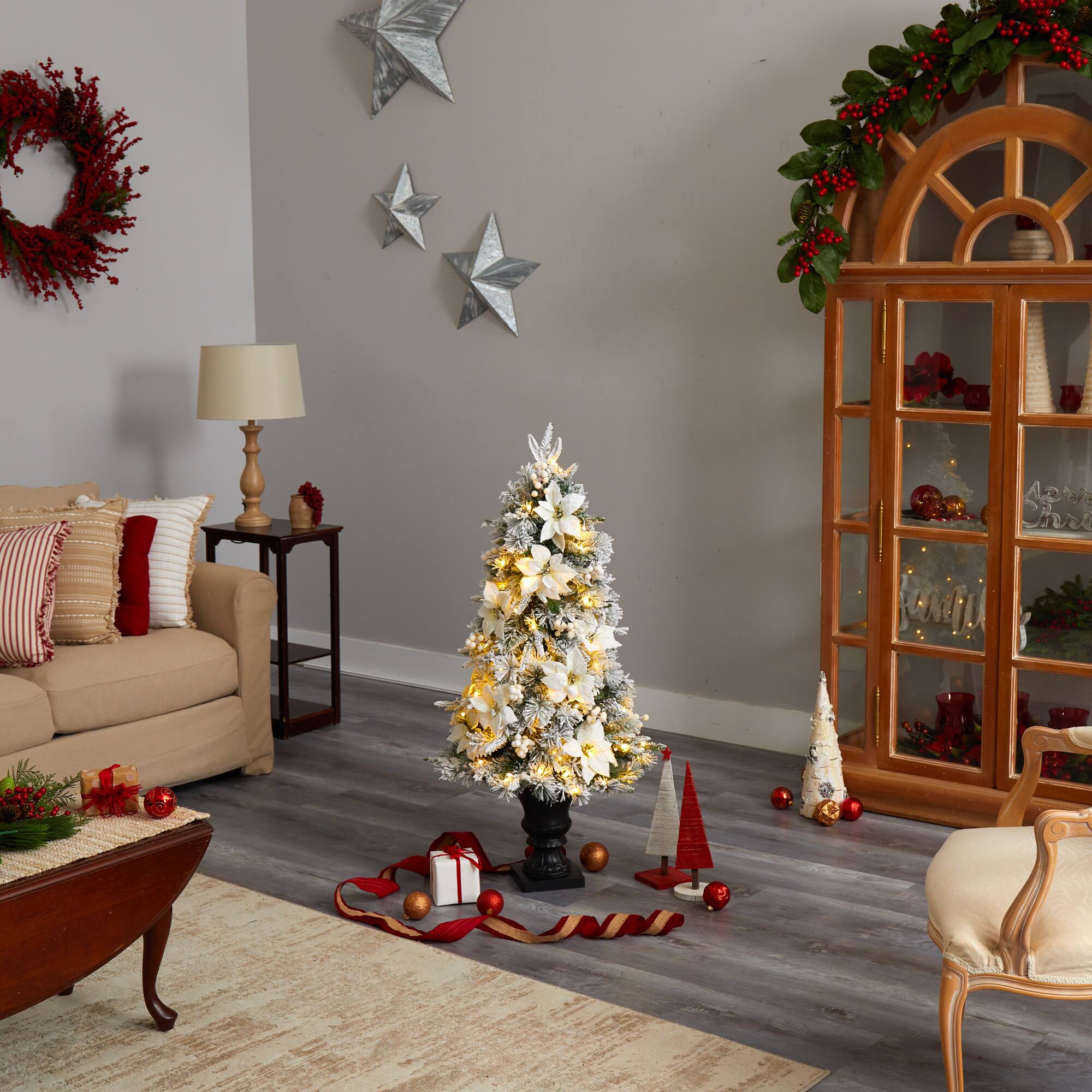 4ft. Pre-Lit Flocked Artificial Christmas Tree in Decorative Urn, Warm White Lights