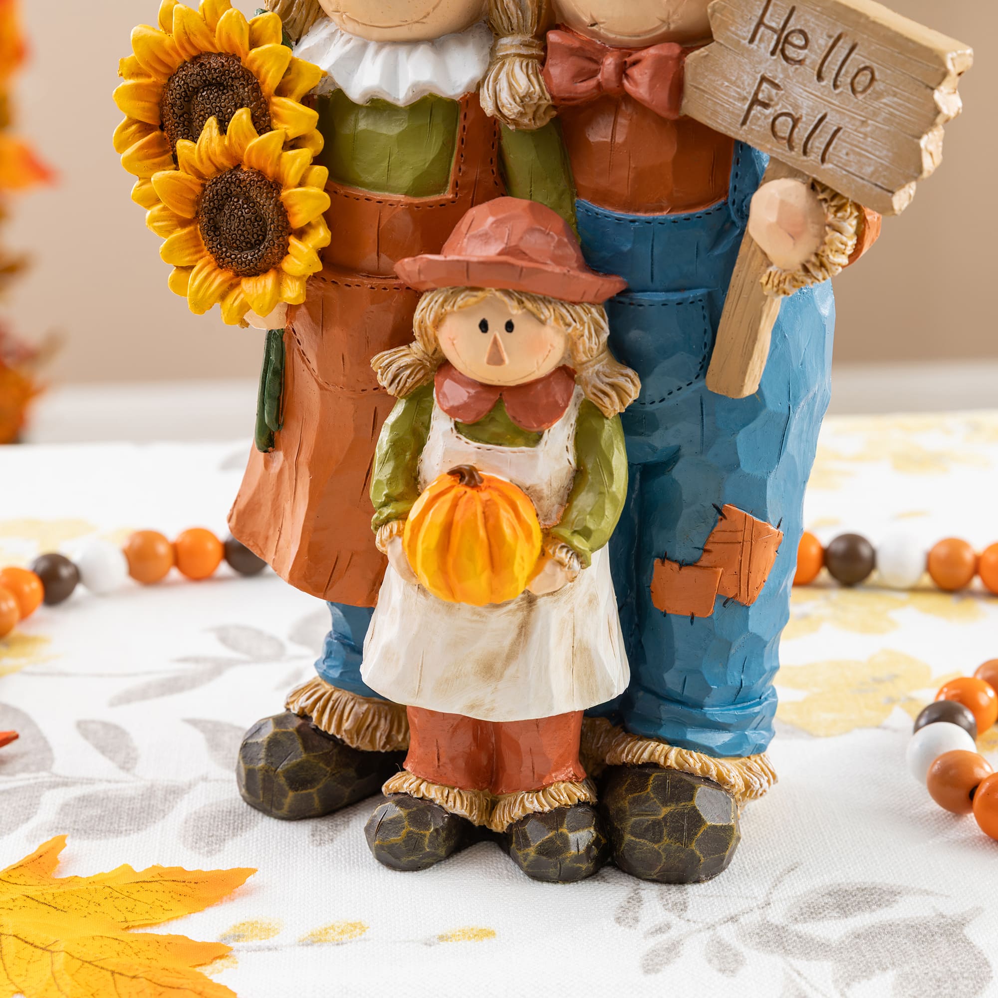 Glitzhome® 10.5" Fall Resin Scarecrow Family Table Decor