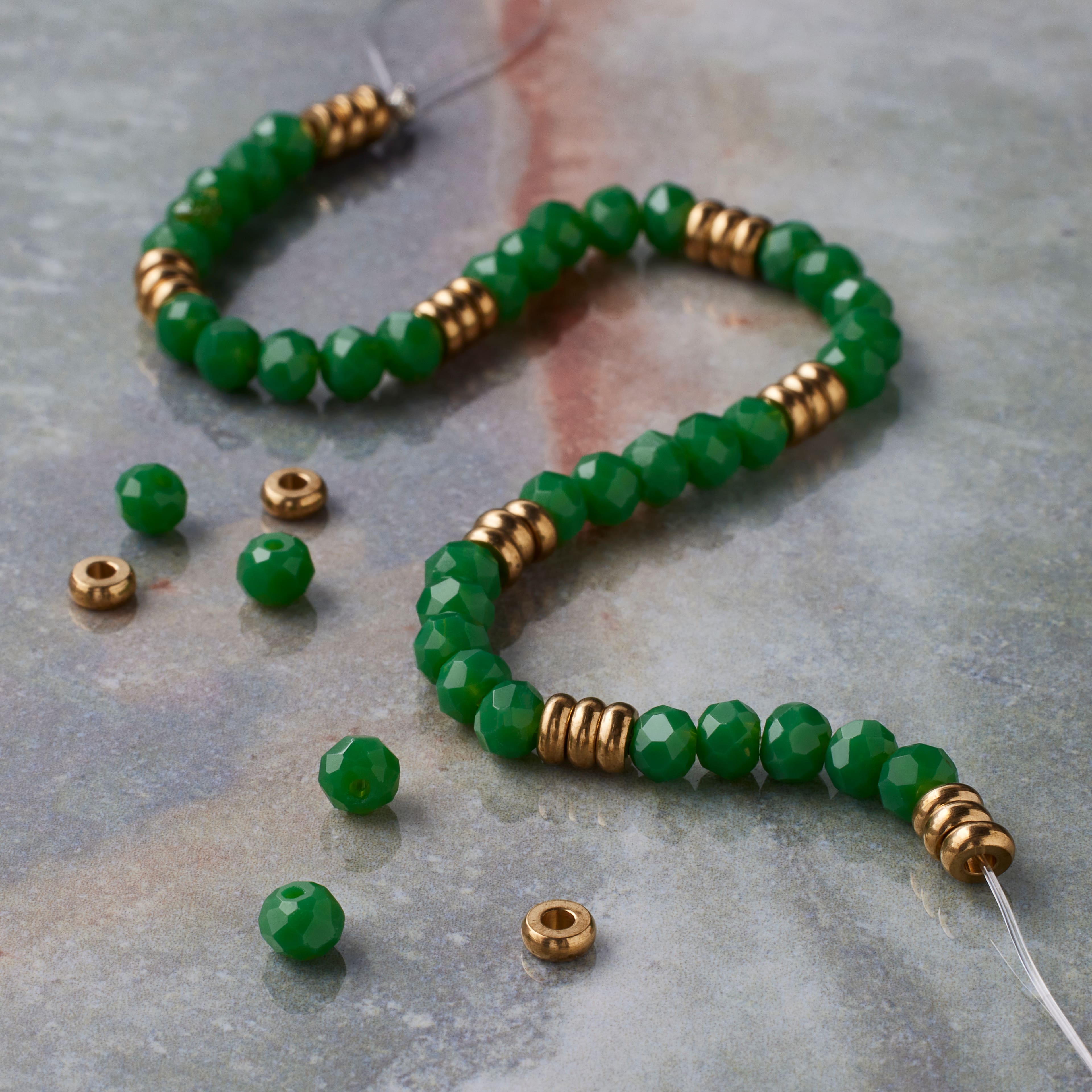 12 Pack: Green Glass Rondelle Beads & Spacers, 4mm by Bead Landing™