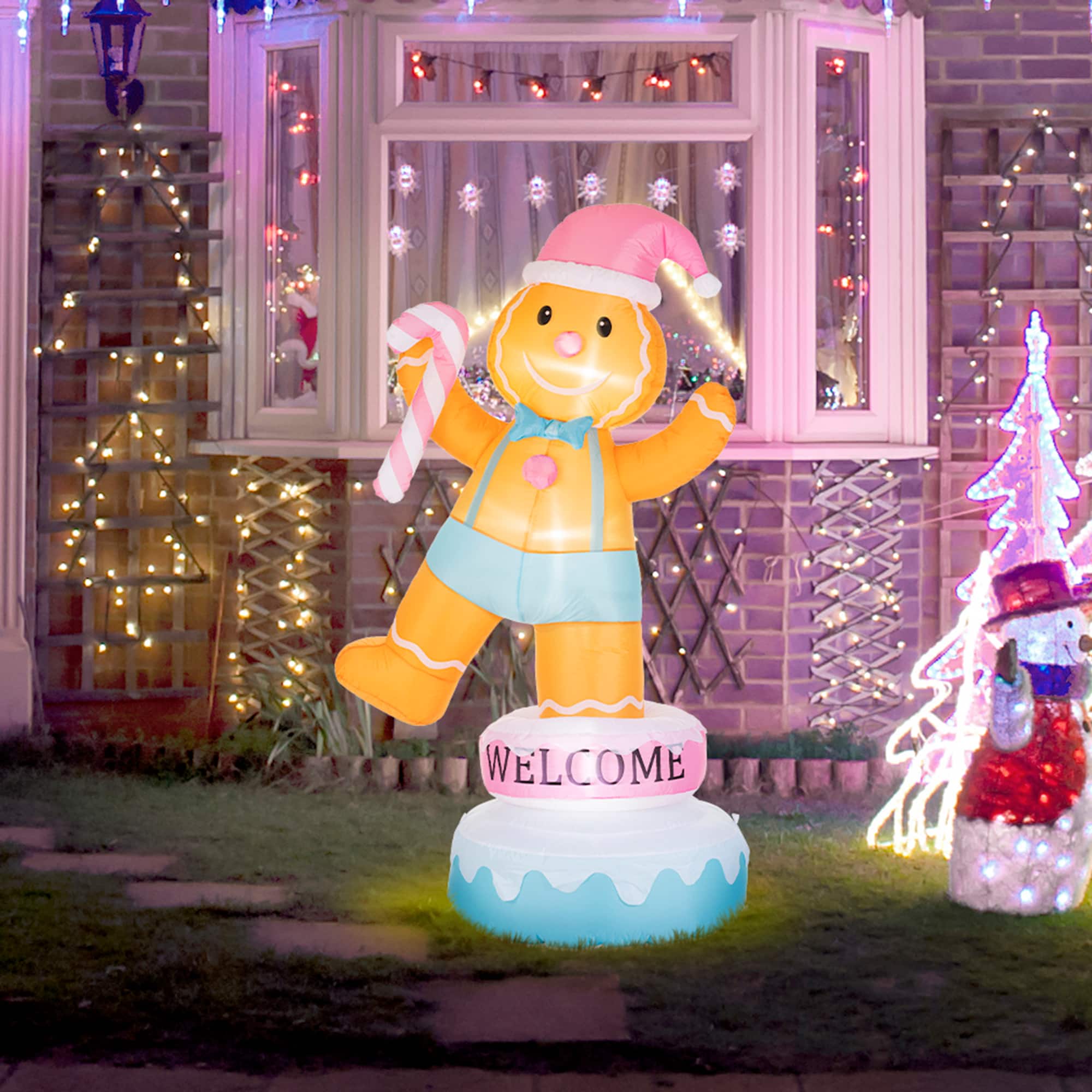 Glitzhome® 6FT Lighted Macaron Inflatable Rotating Gingerbread Man Decor