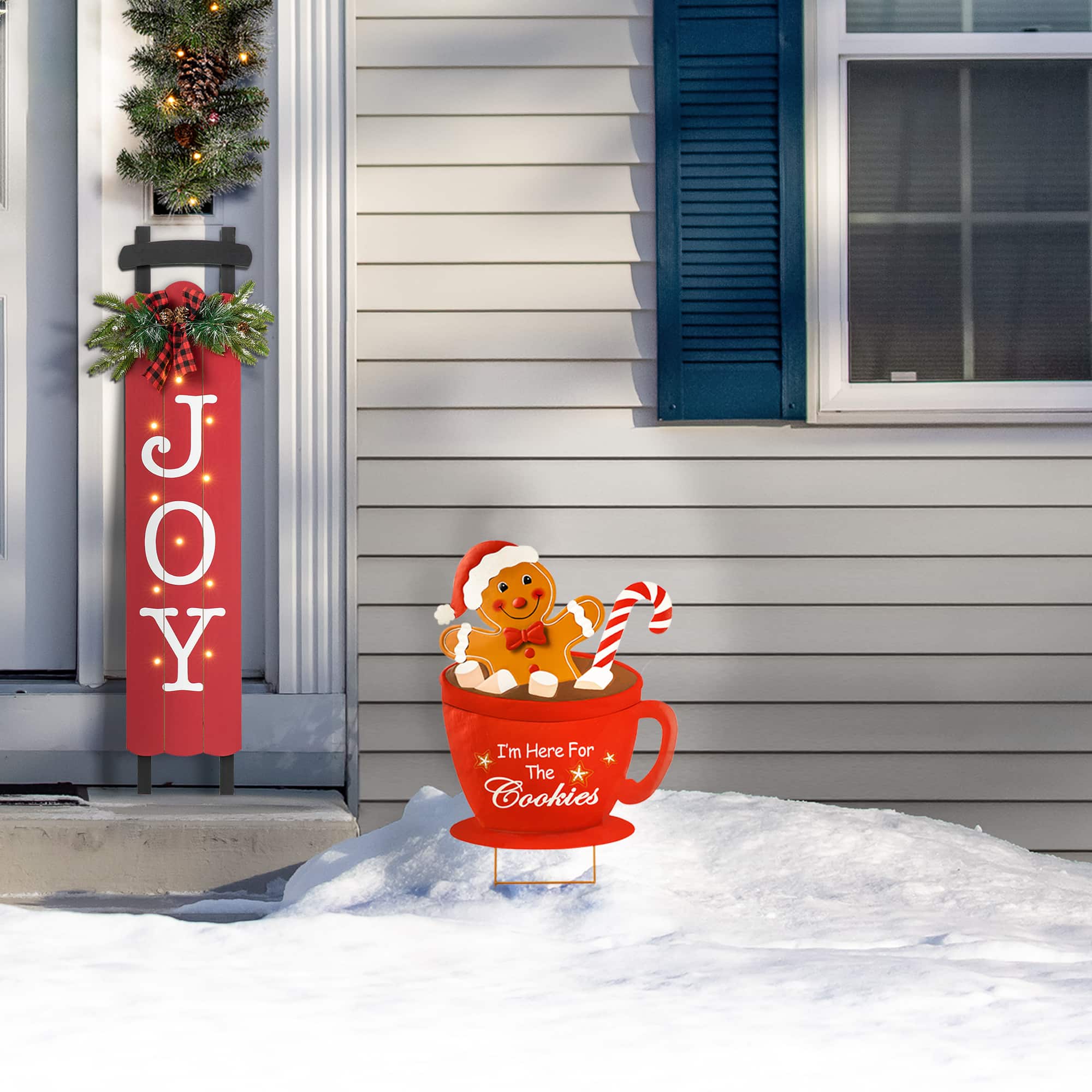 Glitzhome® 30.25" Metal Gingerbread Man in Coffee Mug Yard Stake