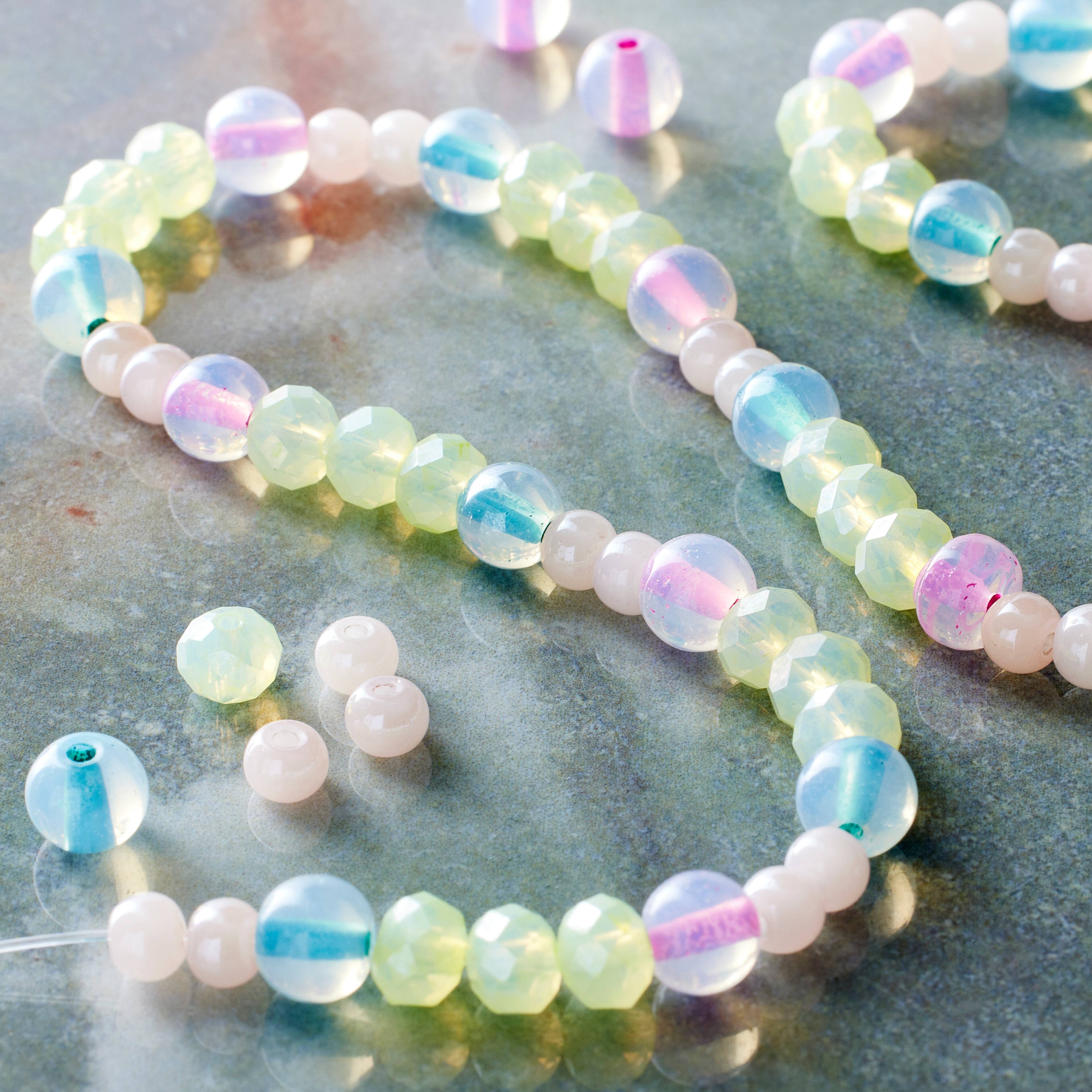 12 Pack: Pastel Faceted Rondelle Beads by Bead Landing™