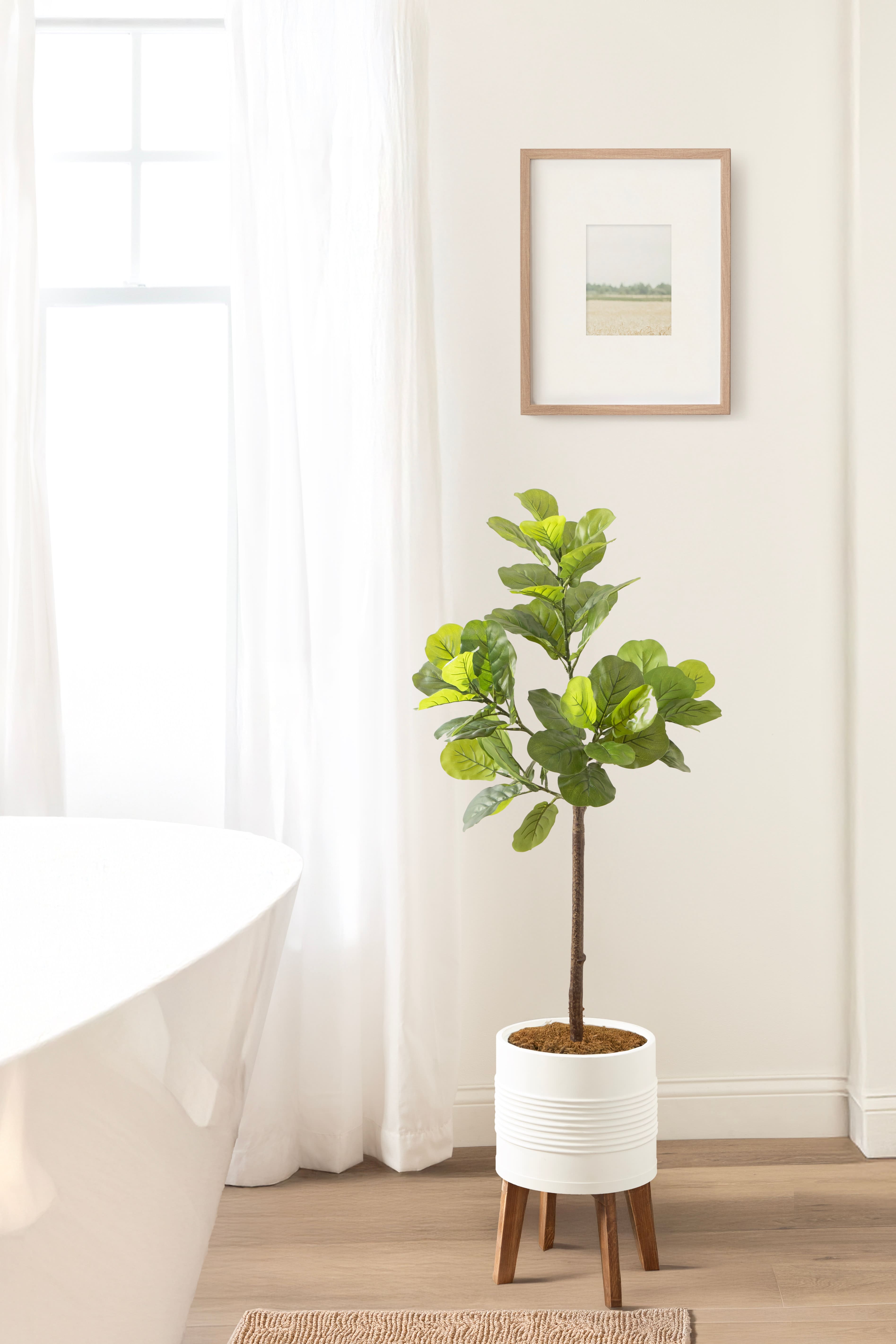 Kate and Laurel 4ft. Fidmont Faux Fiddle Fig Tree with Gavri Planter