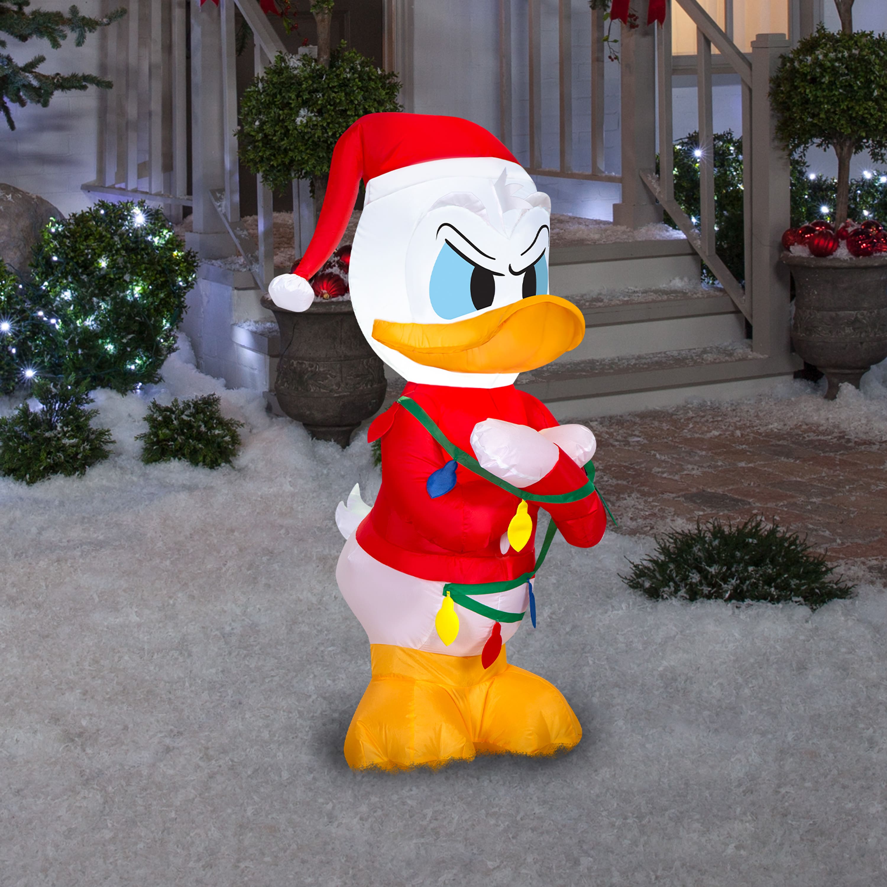 3.5ft. Airblown® Inflatable Disney® Donald Duck in Sweater Christmas Light Scene