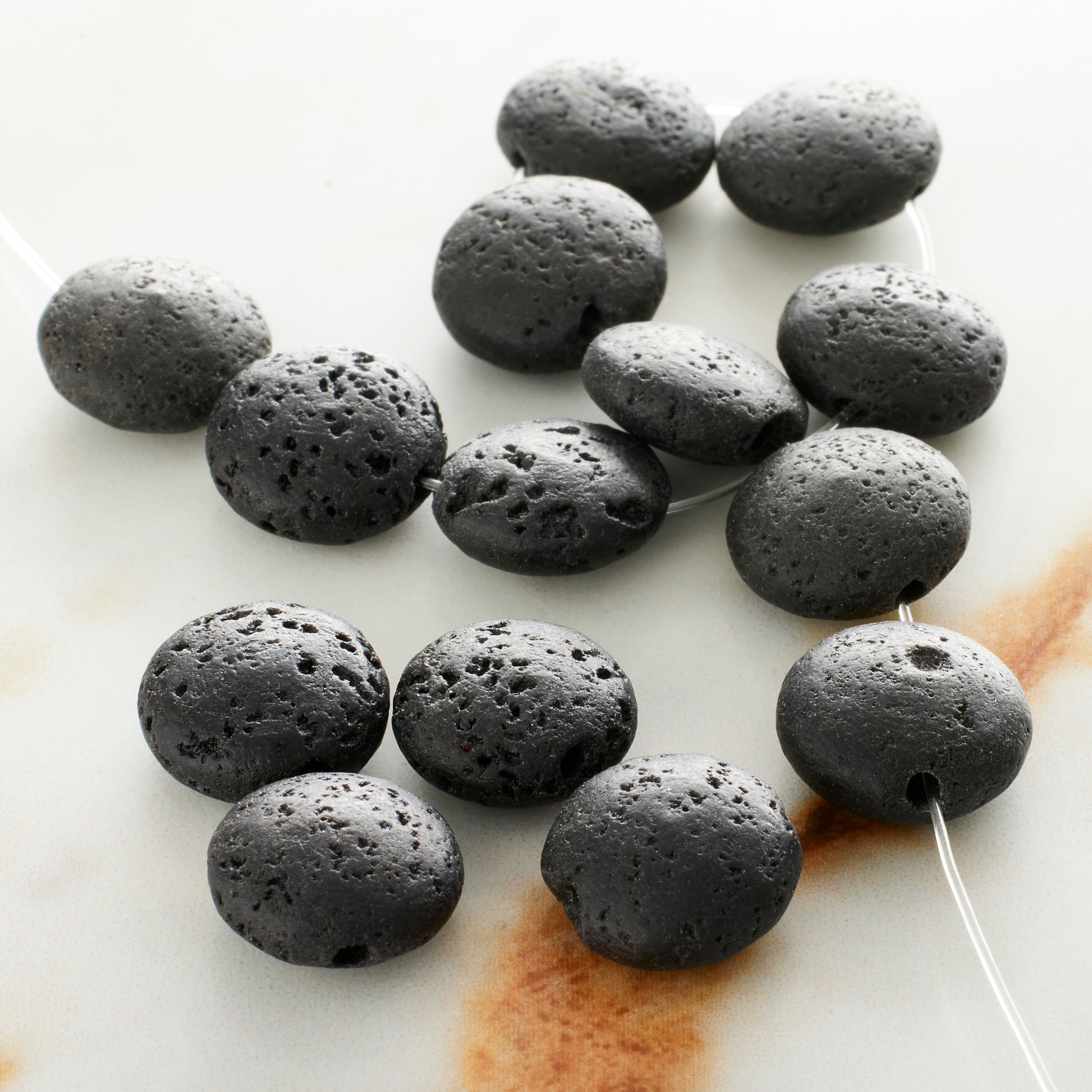 12 Pack: Black Lava Stone Lentil Beads, 12mm by Bead Landing™
