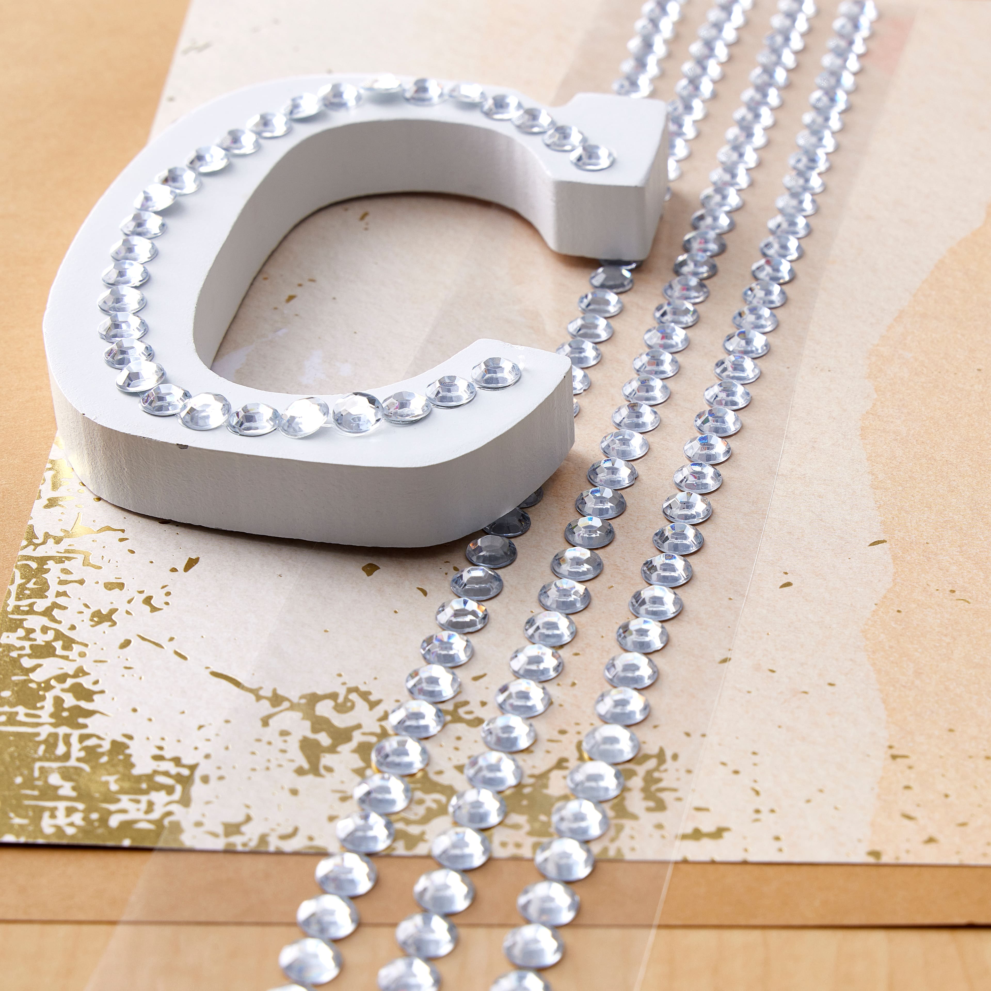 12 Packs: 4 ct. (48 total) 8mm Clear Rhinestone Borders by Recollections™