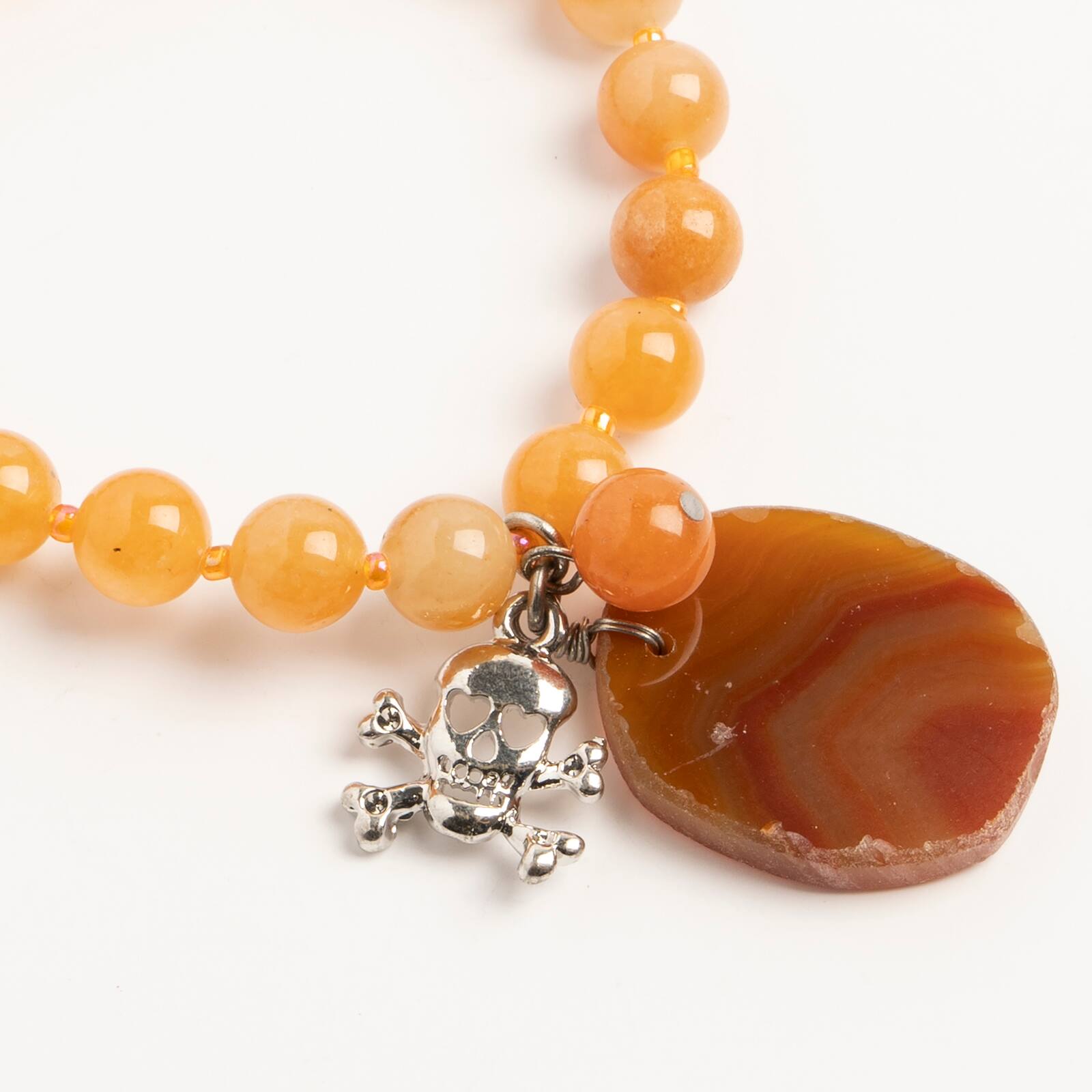 John Bead Peach Aventurine Stretch Bracelet with Agate & Skull Charms