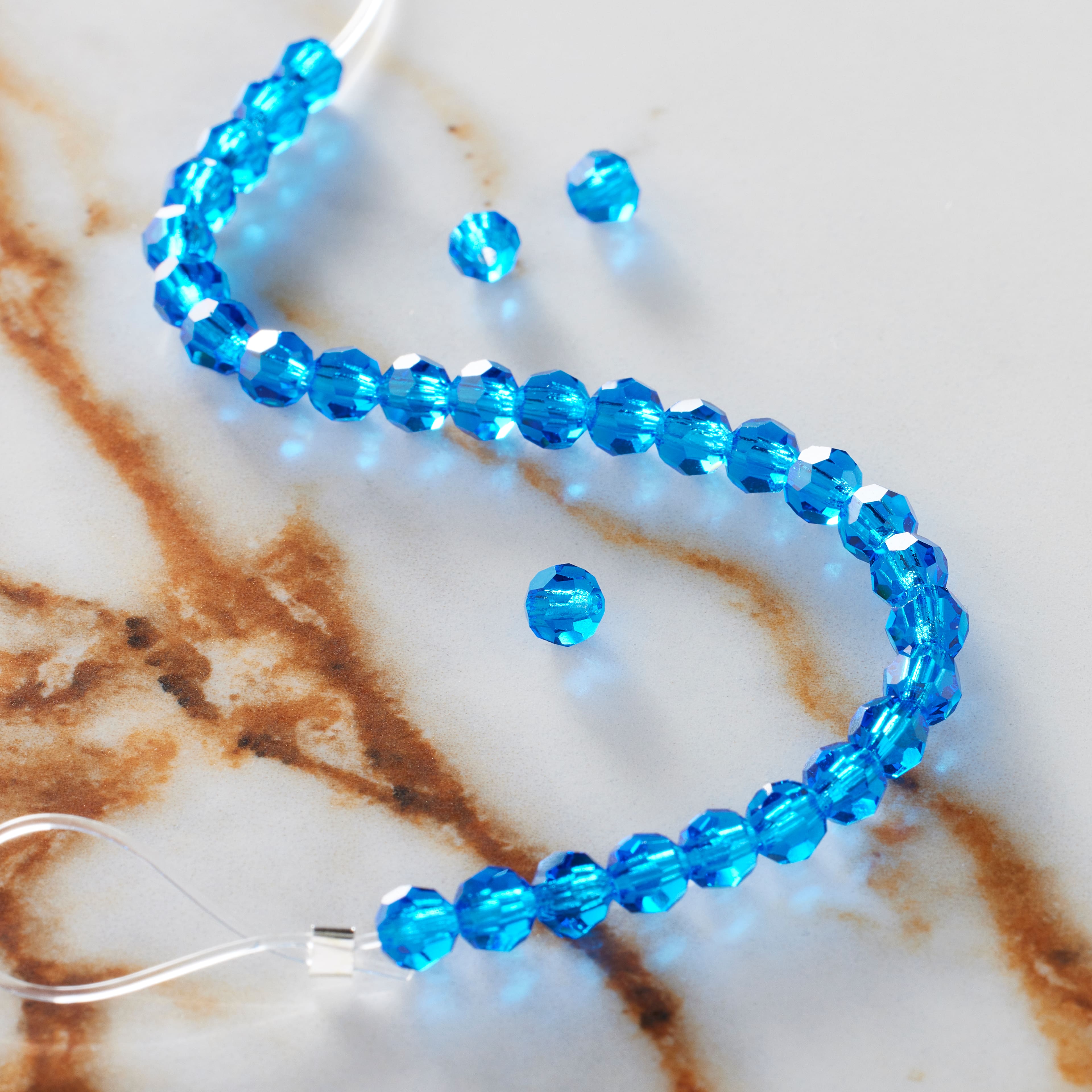 12 Packs: 31 ct. (372 total) Preciosa Glass Crystal Round Beads, 4mm by Bead Landing™