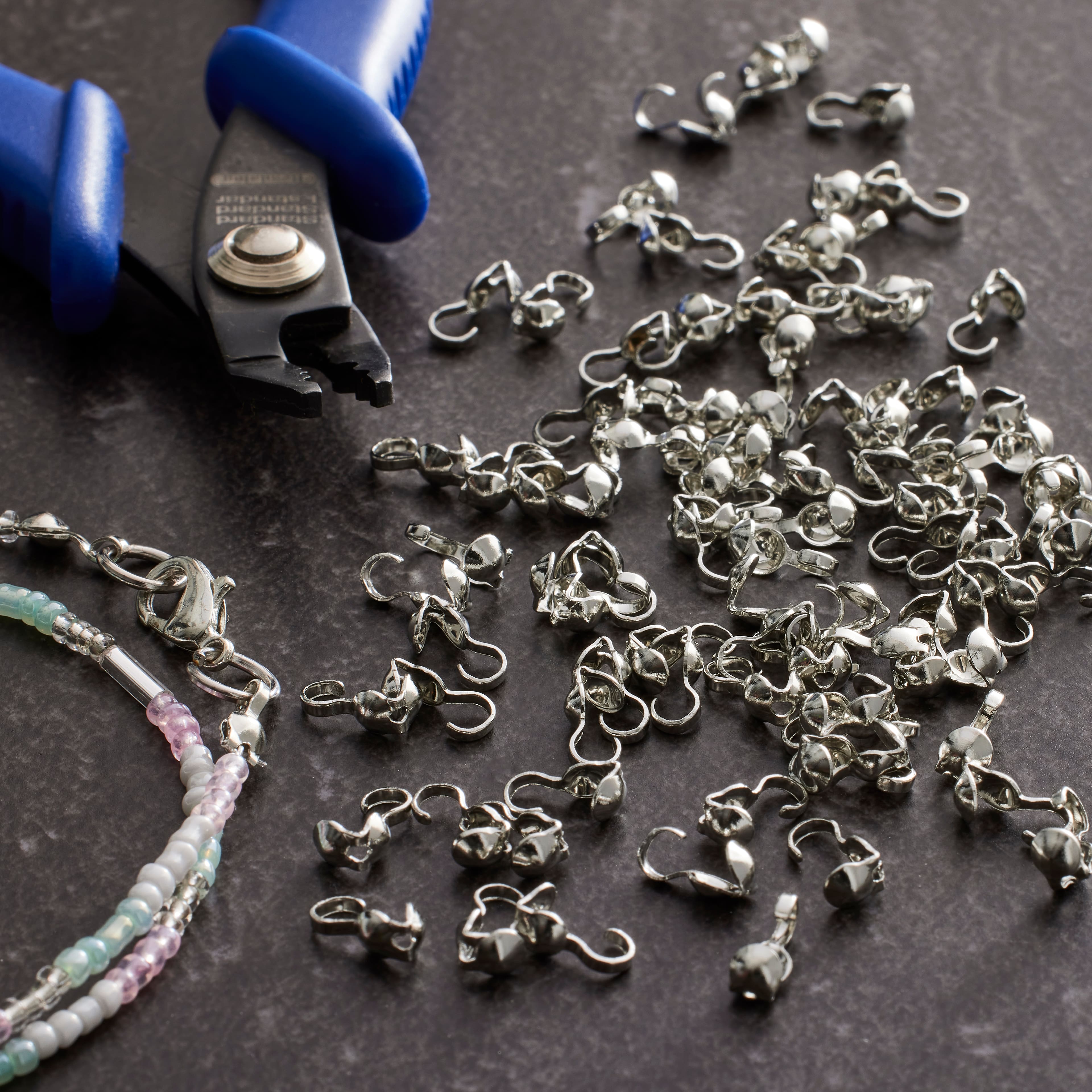 12 Packs: 125 ct. (1,500 total) 4mm Rhodium Crimp Bead Covers by Bead Landing™