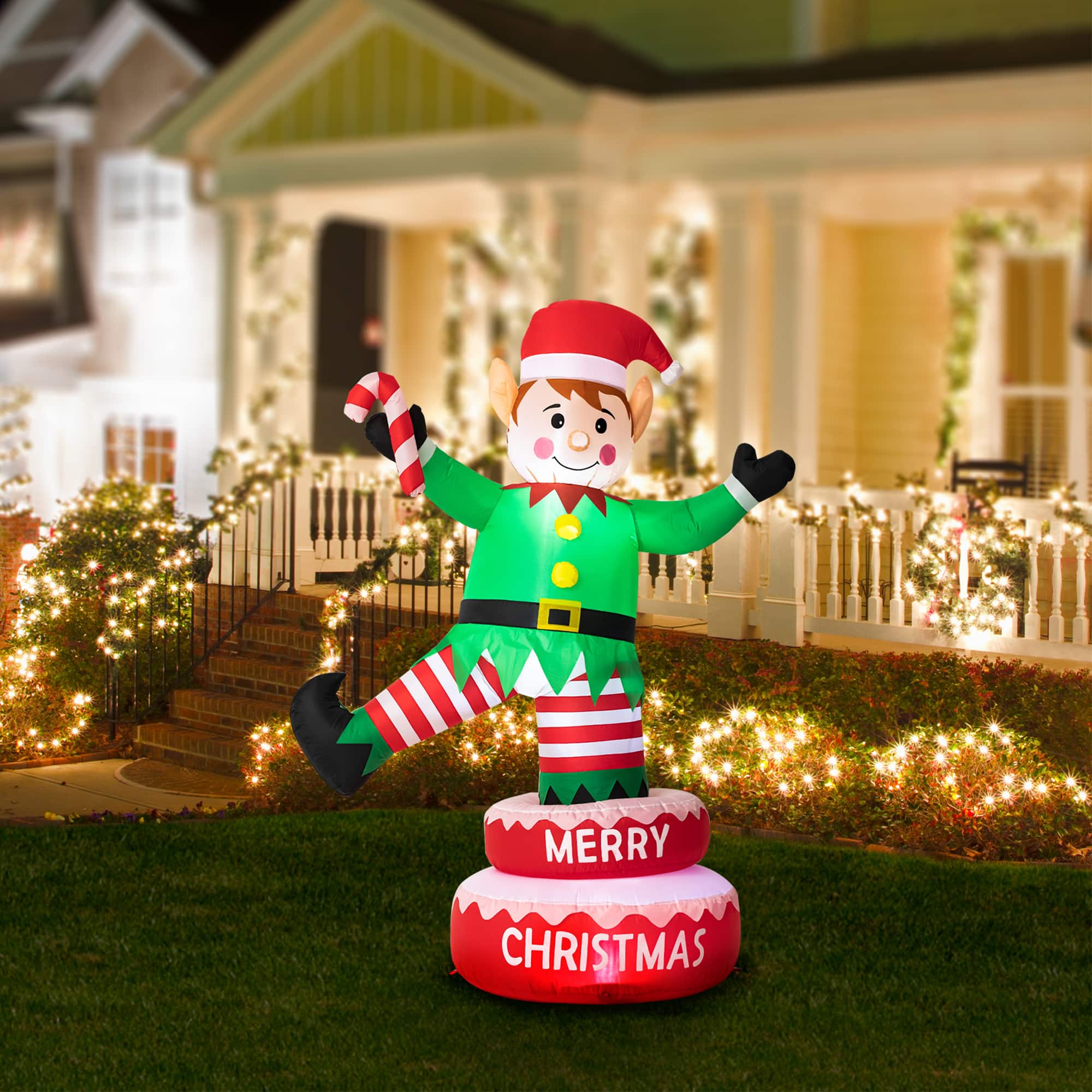 Glitzhome® 6ft. Light-Up Inflatable Rotating Elf Décor
